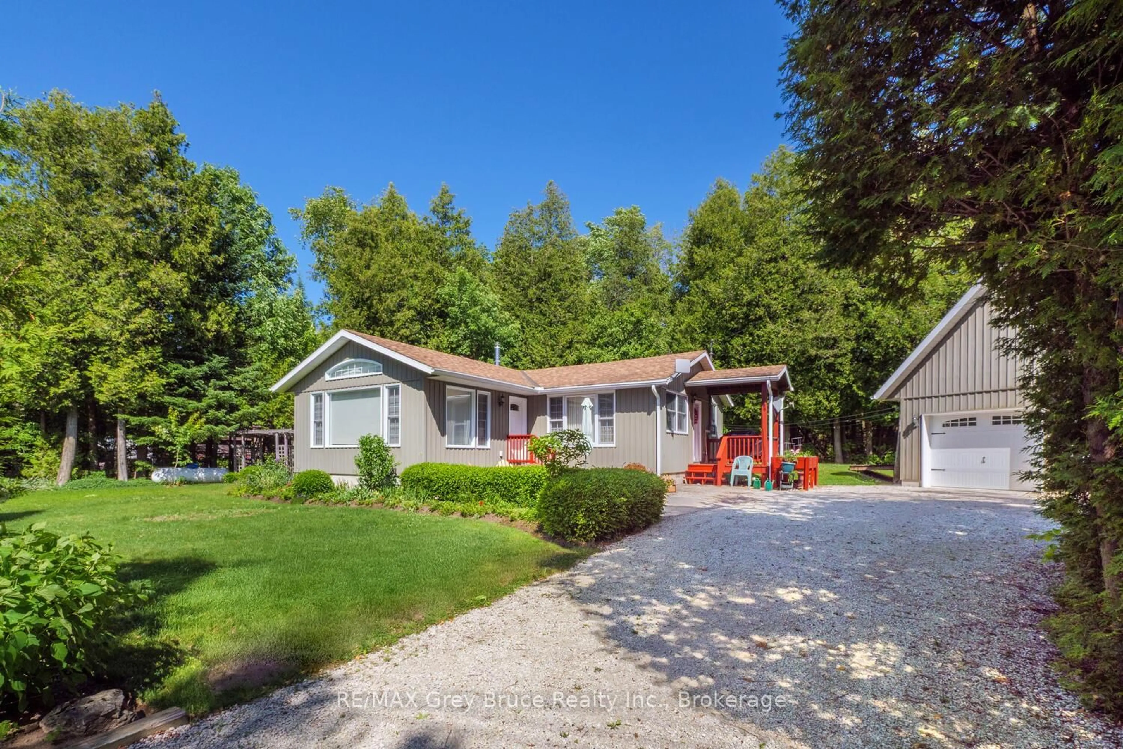 A pic from outside/outdoor area/front of a property/back of a property/a pic from drone, street for 186 Hope Bay Rd, South Bruce Peninsula Ontario N0H 2T0