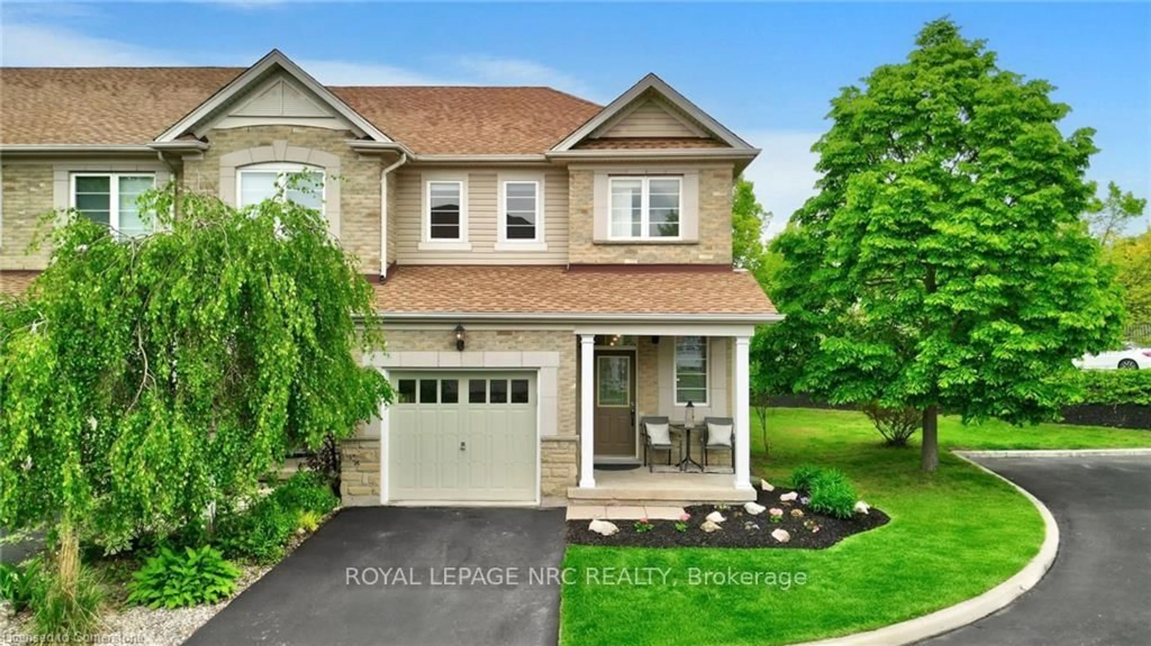 Home with vinyl exterior material, street for 28 Doon Mills Dr #17, Kitchener Ontario N2P 2W9