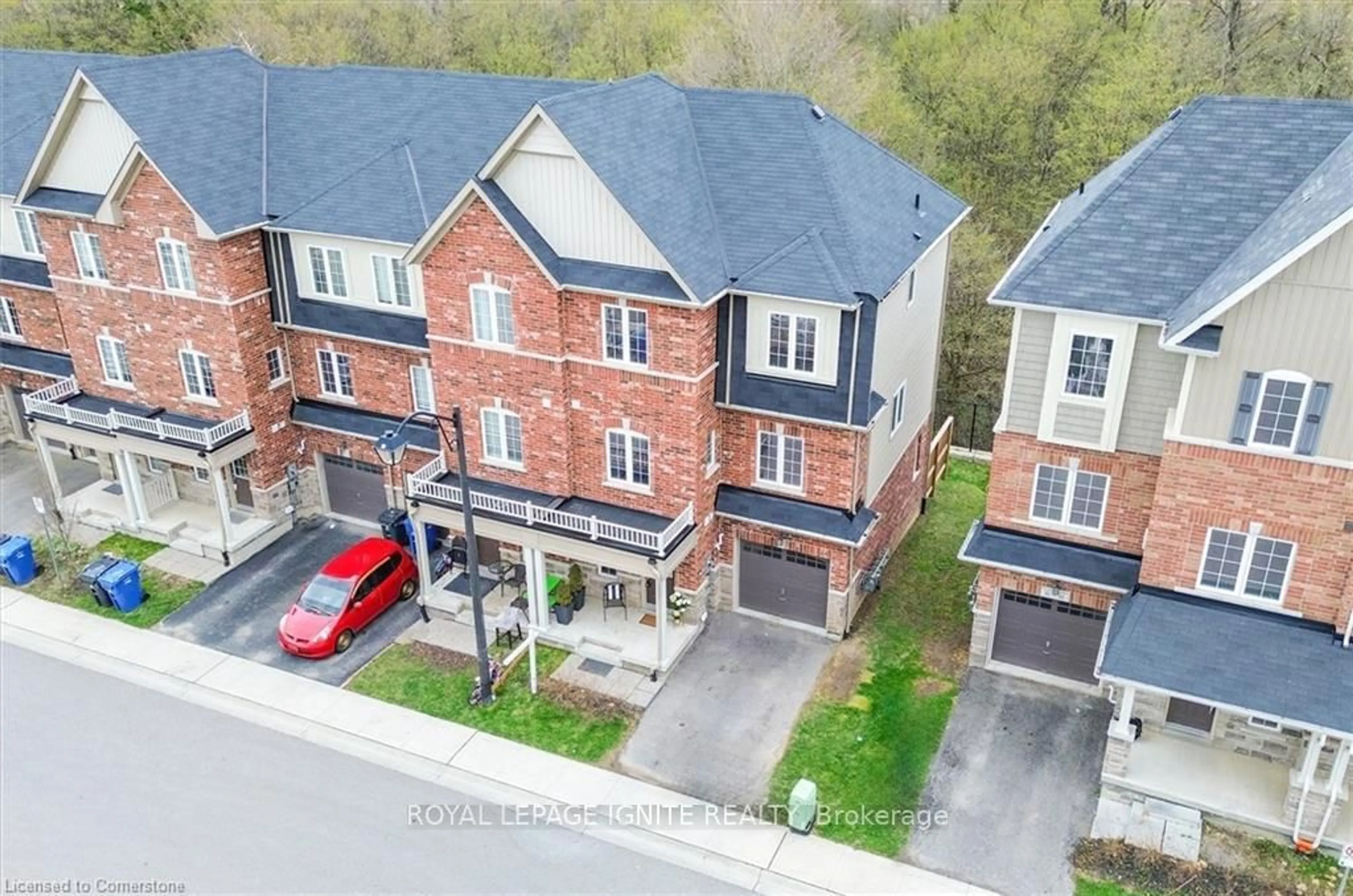 A pic from outside/outdoor area/front of a property/back of a property/a pic from drone, street for 88 Decorso Dr #51, Guelph Ontario N1L 0A9