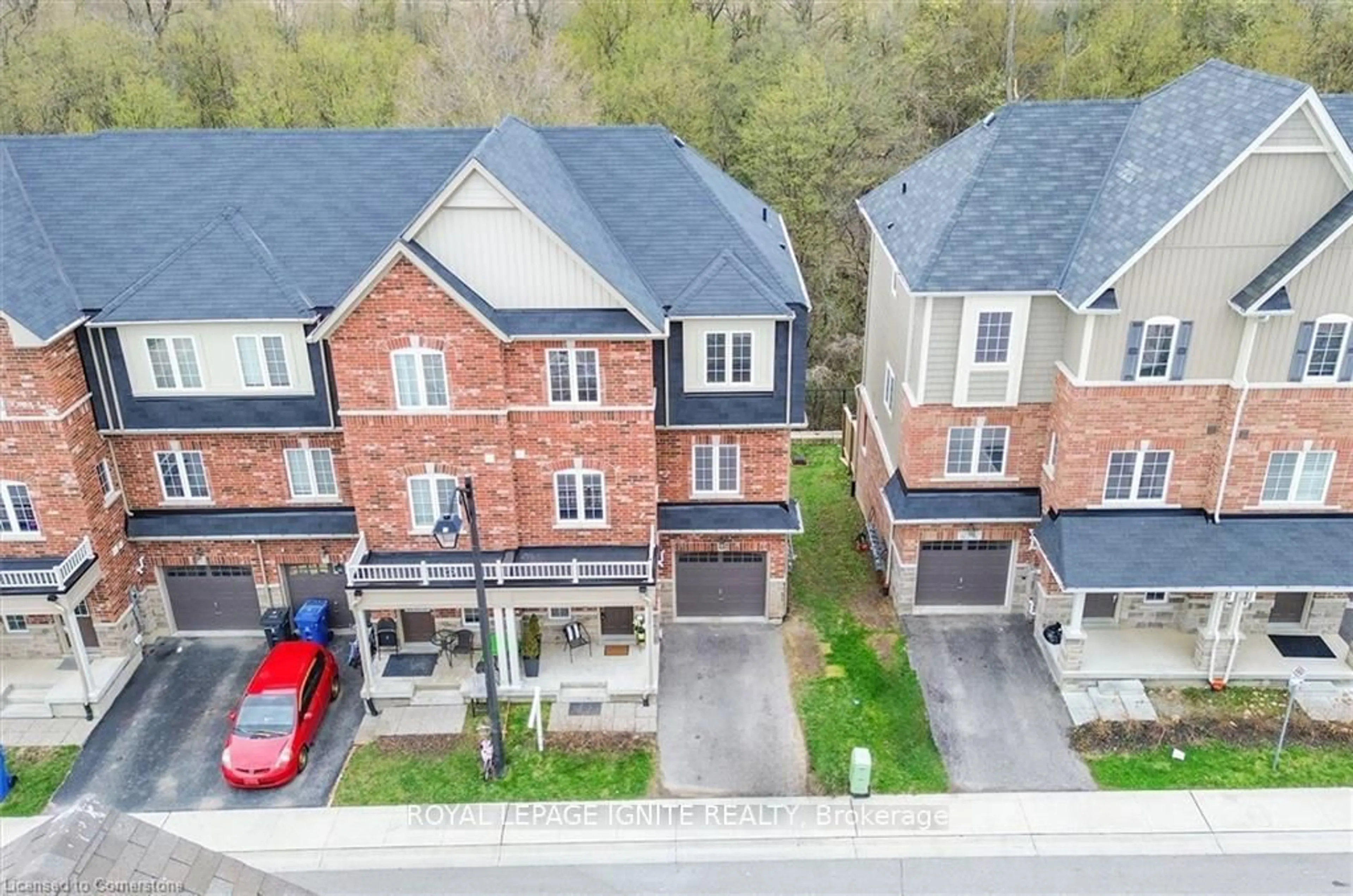 A pic from outside/outdoor area/front of a property/back of a property/a pic from drone, street for 88 Decorso Dr #51, Guelph Ontario N1L 0A9