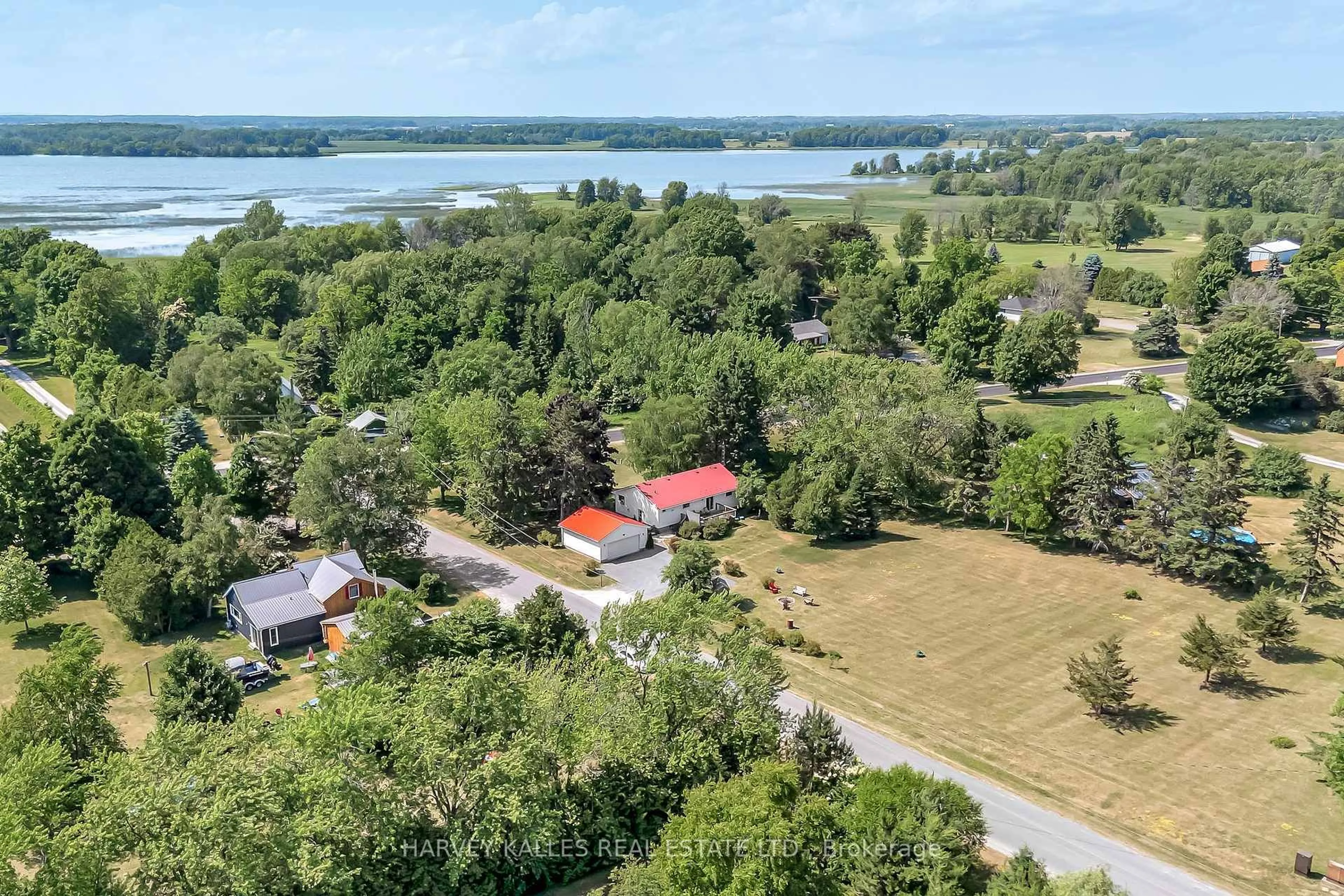 A pic from outside/outdoor area/front of a property/back of a property/a pic from drone, water/lake/river/ocean view for 17 Kleinsteuber Park Rd, Prince Edward County Ontario K0K 2T0