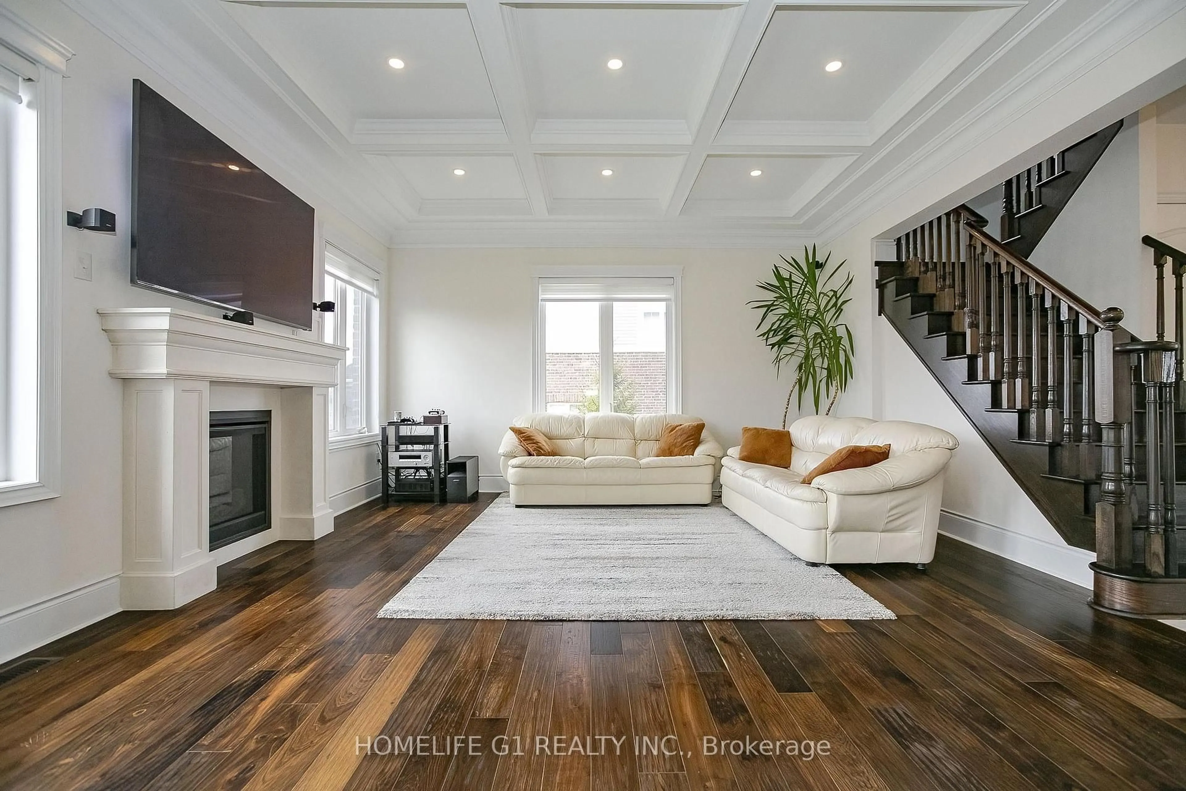 Living room with furniture, wood/laminate floor for 18 Meek Ave, Mono Ontario L9W 6W8