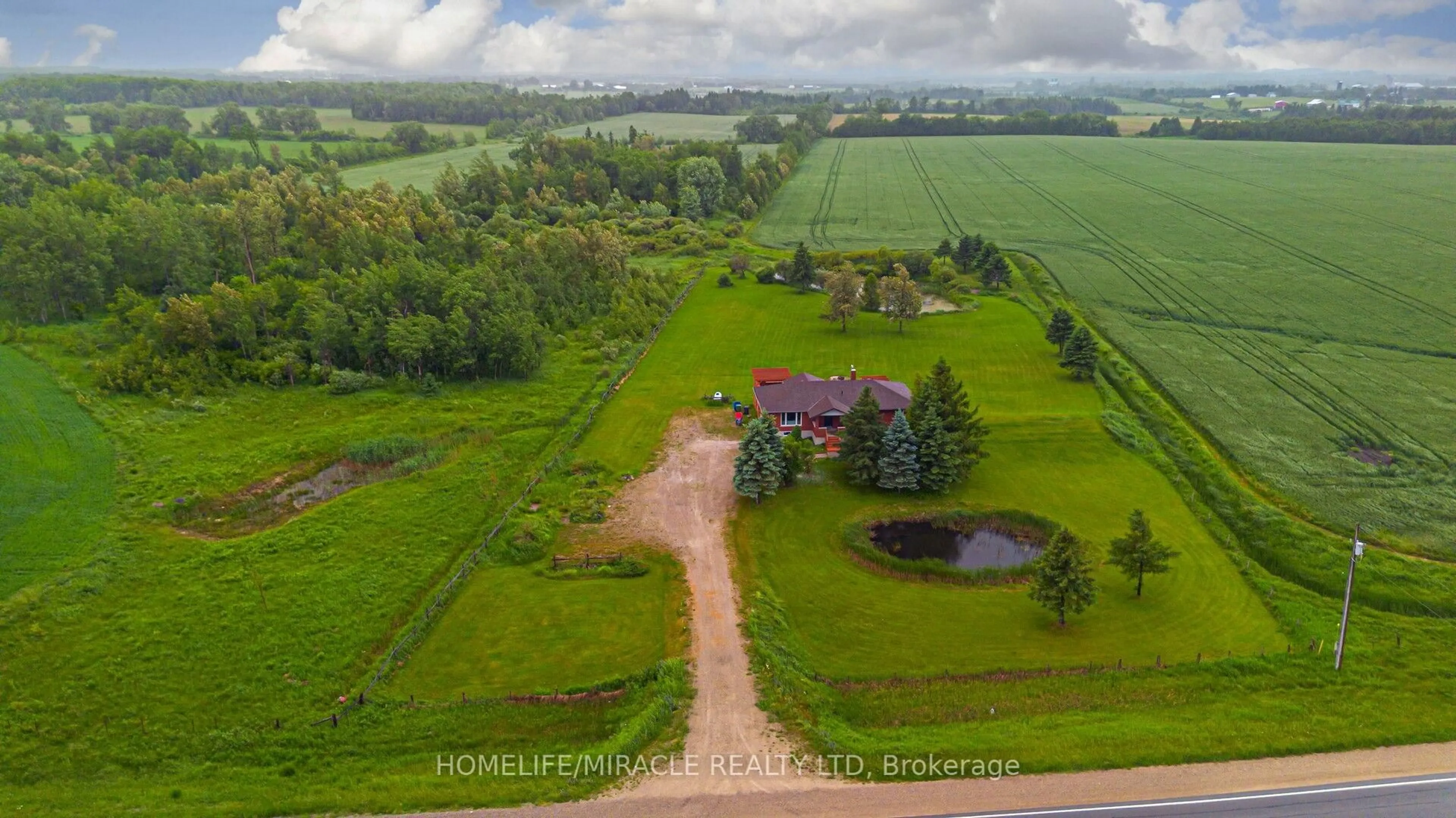 A pic from outside/outdoor area/front of a property/back of a property/a pic from drone, unknown for 773154 Highway 10, Grey Highlands Ontario N0C 1L0