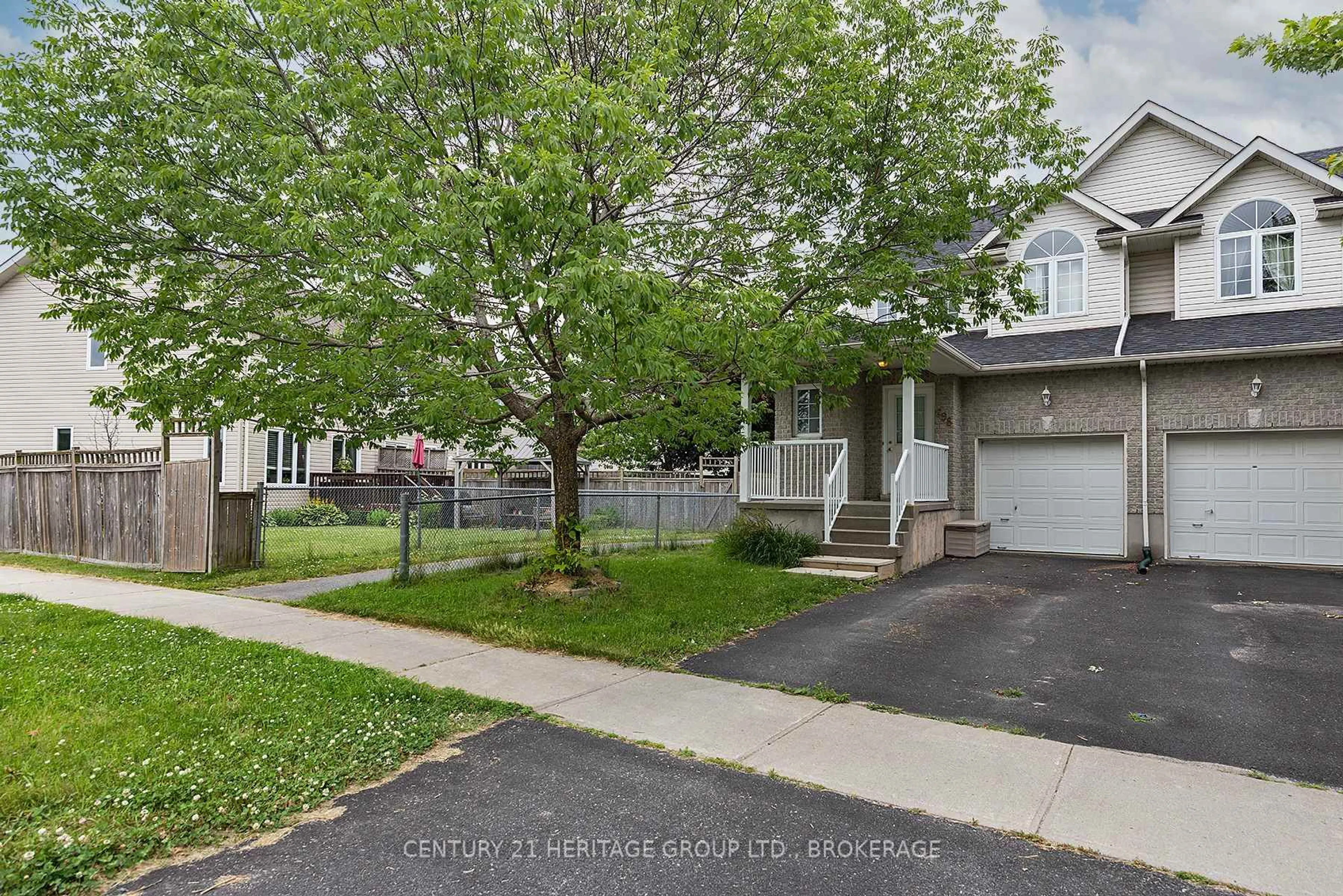 A pic from outside/outdoor area/front of a property/back of a property/a pic from drone, street for 698 MacLean Crt, Kingston Ontario K7K 7L8