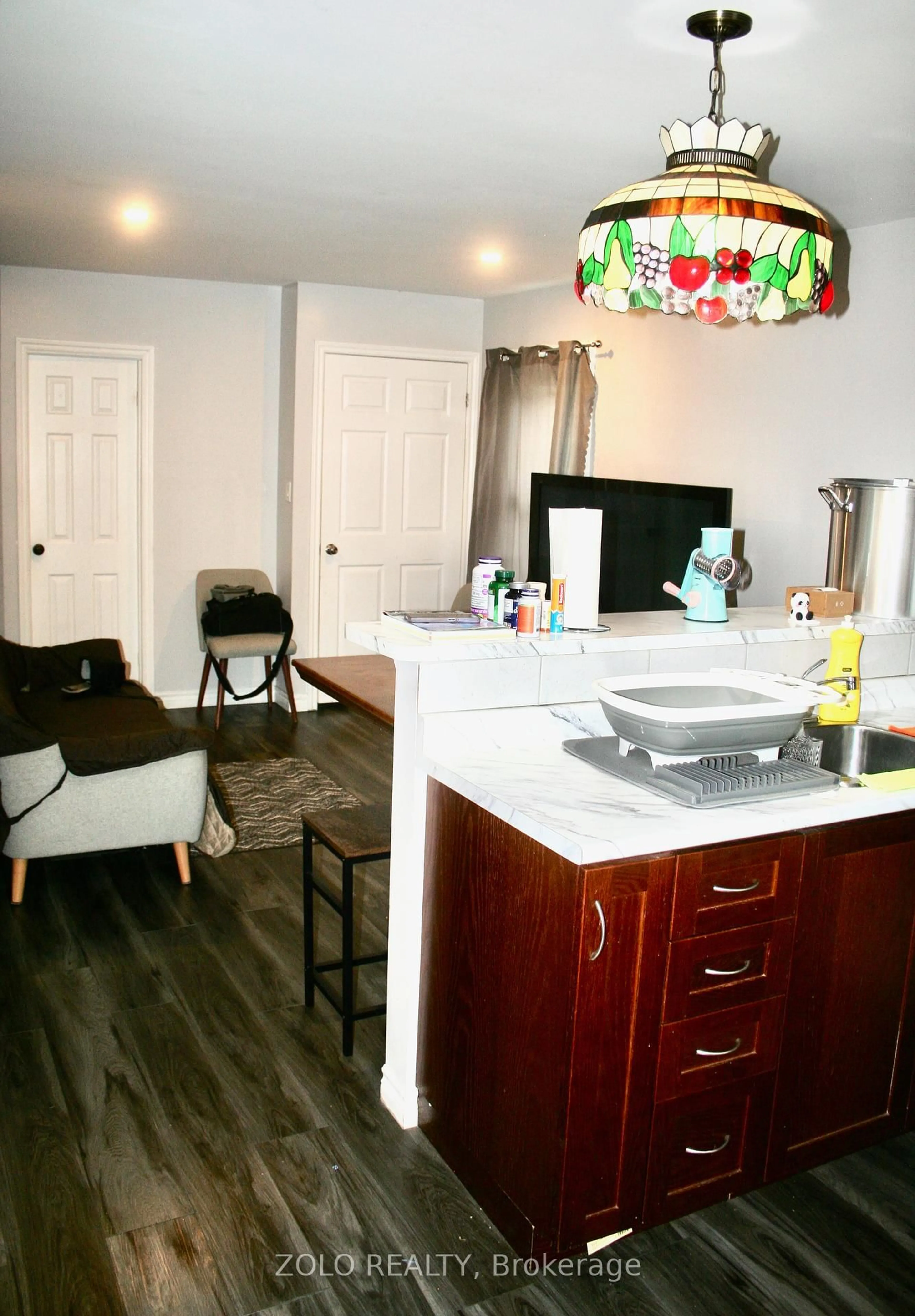 Open concept kitchen, wood/laminate floor for 49 Cohoe St, Welland Ontario L3B 3V2
