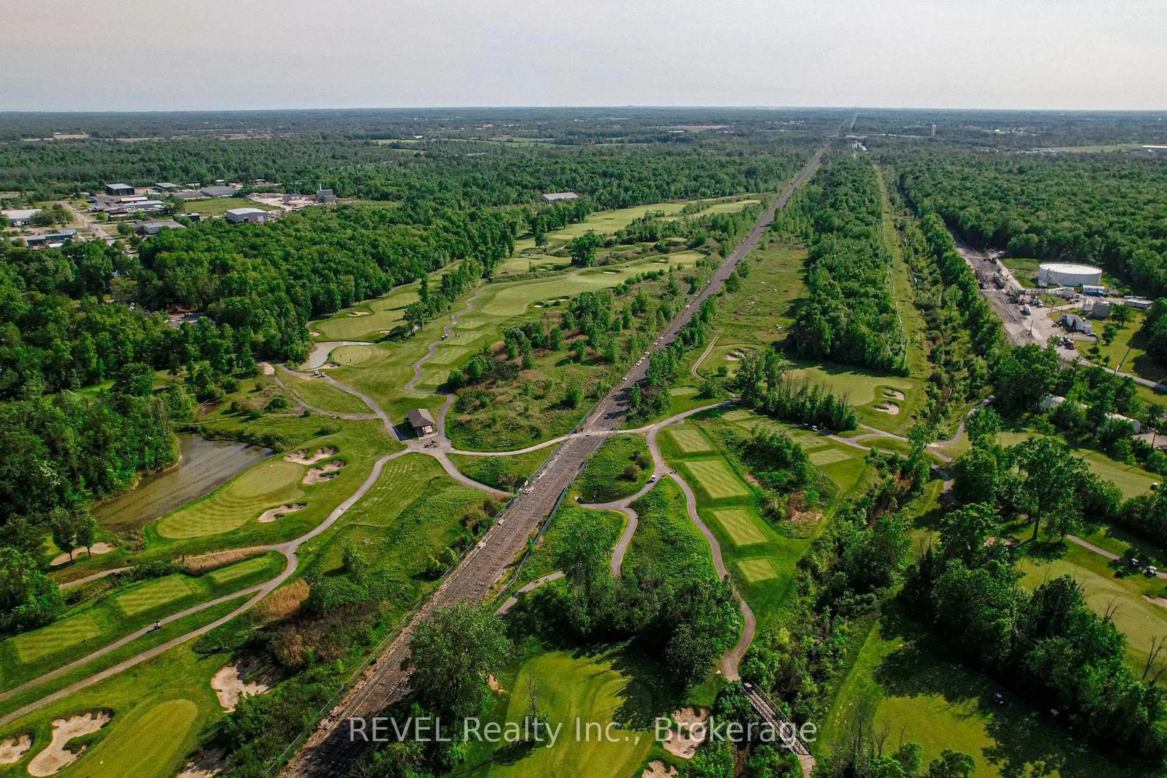 A pic from outside/outdoor area/front of a property/back of a property/a pic from drone, forest/trees view for 7711 GREEN VISTA Gate #1003, Niagara Falls Ontario L2G 0A8