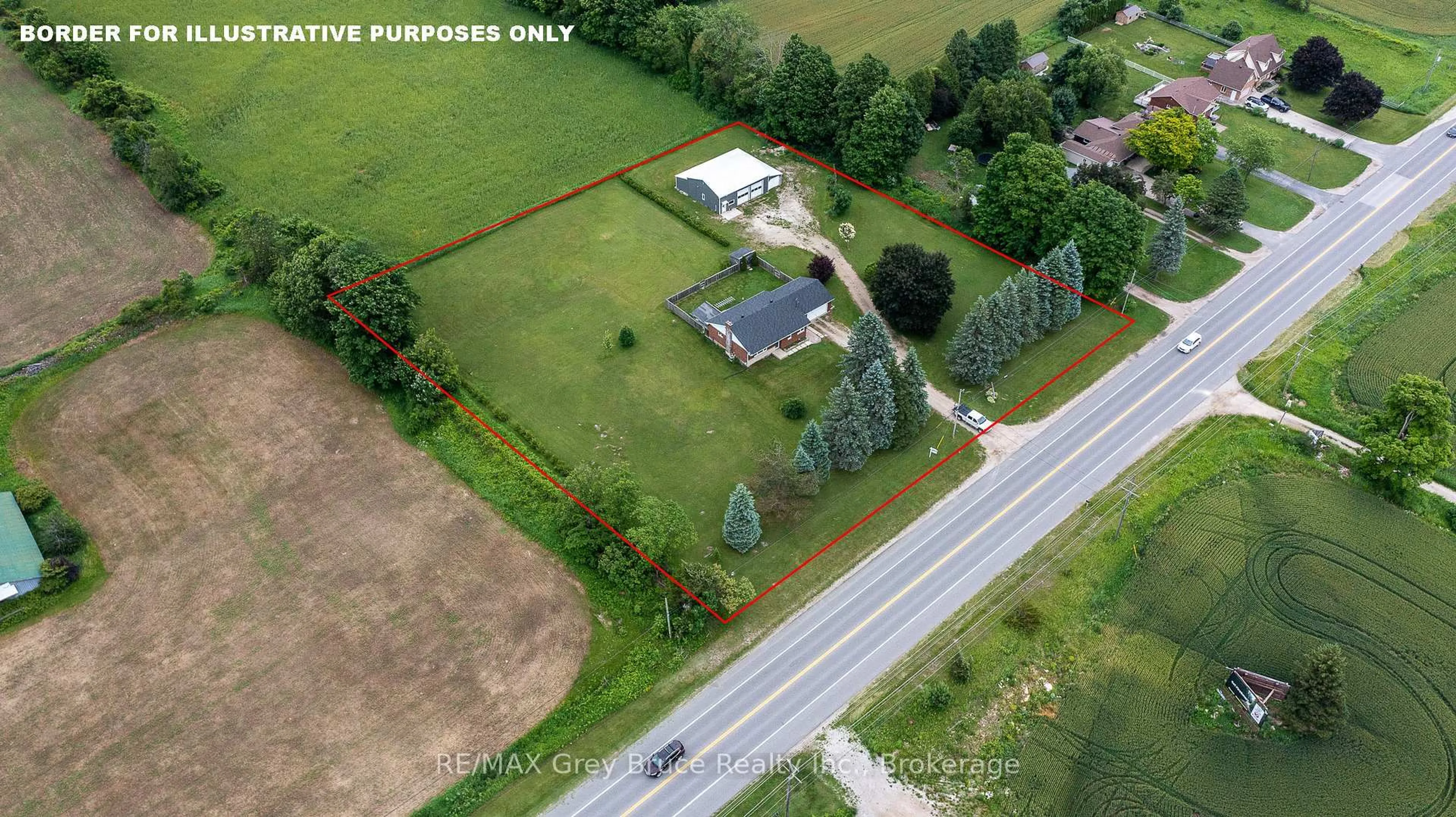 A pic from outside/outdoor area/front of a property/back of a property/a pic from drone, building for 718449 6 Highway, Georgian Bluffs Ontario N4K 5N7