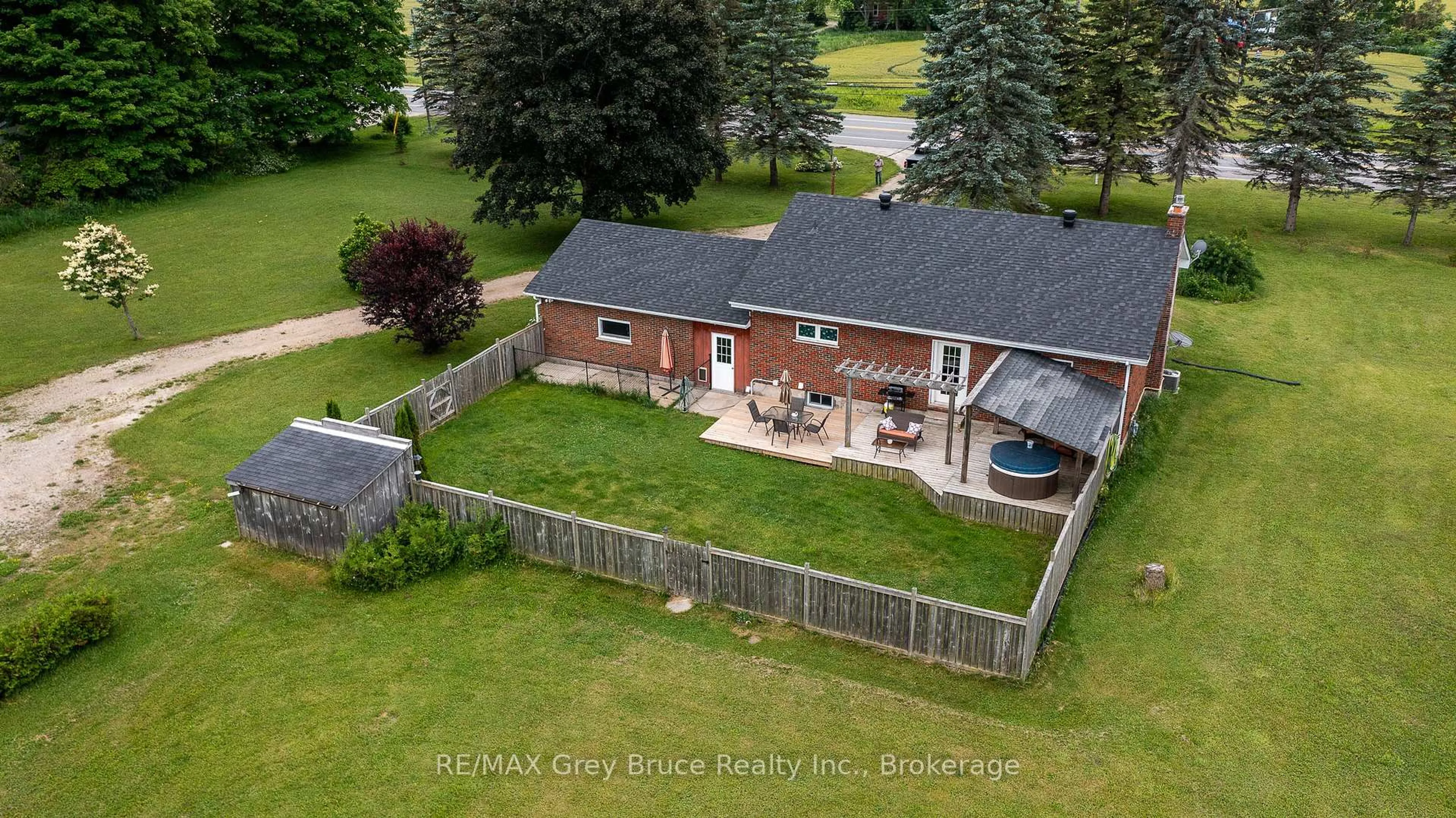 A pic from outside/outdoor area/front of a property/back of a property/a pic from drone, unknown for 718449 6 Highway, Georgian Bluffs Ontario N4K 5N7