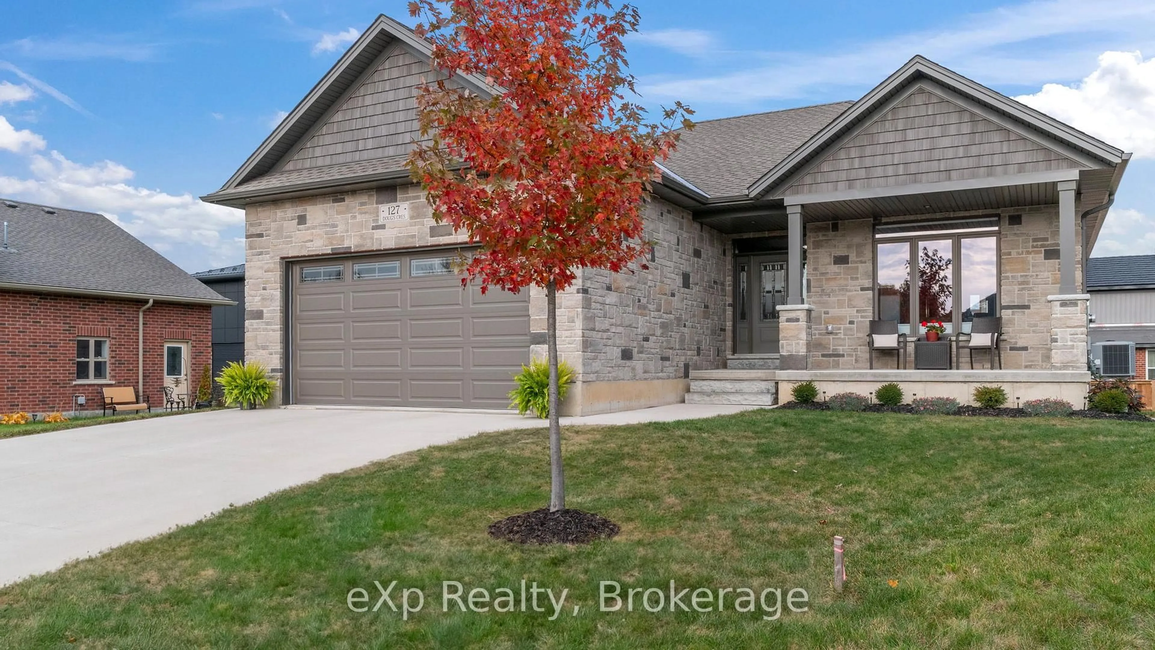 Home with brick exterior material, street for 127 DOUG'S Cres, Wellington North Ontario N0G 2L4