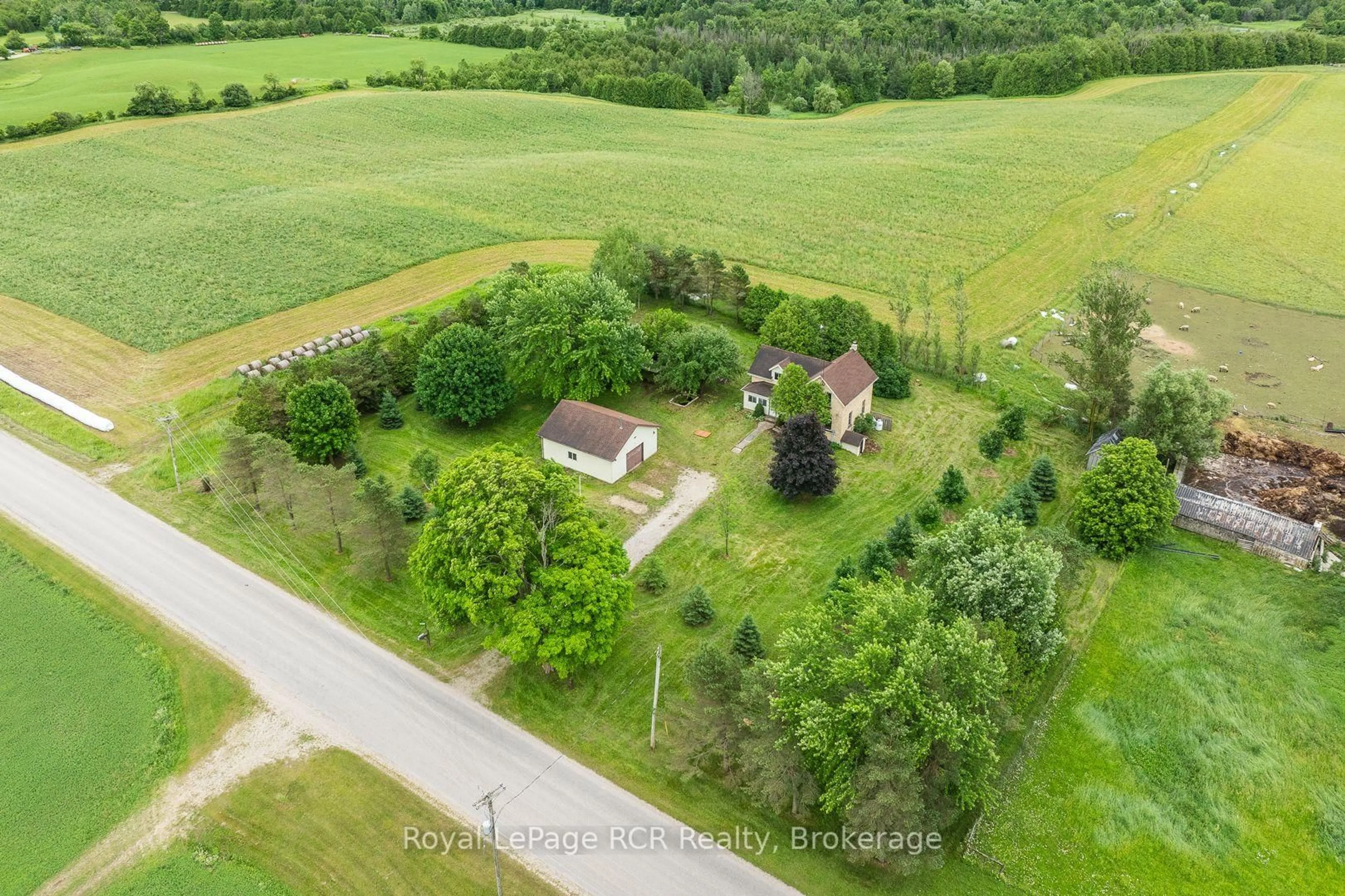 A pic from outside/outdoor area/front of a property/back of a property/a pic from drone, street for 422014 Concession 6 NDR, West Grey Ontario N0G 1S0