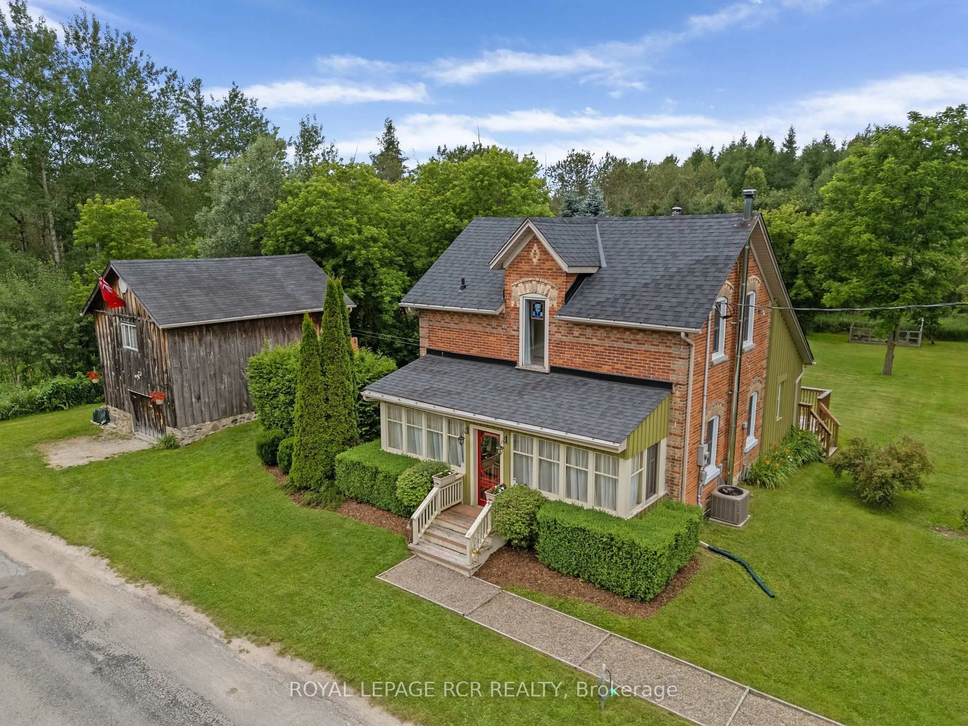 A pic from outside/outdoor area/front of a property/back of a property/a pic from drone, street for 22021 E GARA-ERIN TLINE, East Garafraxa Ontario L9W 7G4