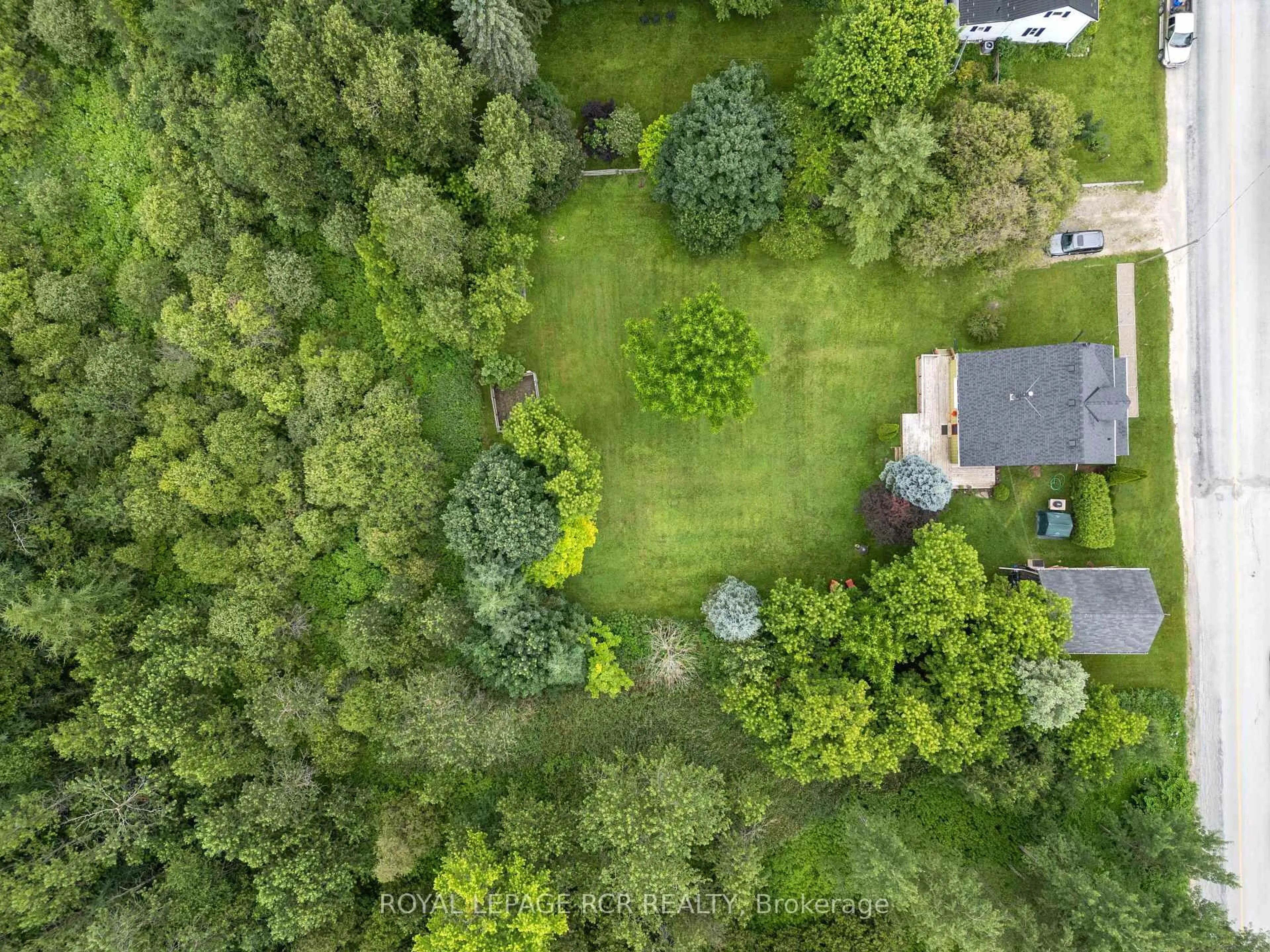 A pic from outside/outdoor area/front of a property/back of a property/a pic from drone, forest/trees view for 22021 E GARA-ERIN TLINE, East Garafraxa Ontario L9W 7G4