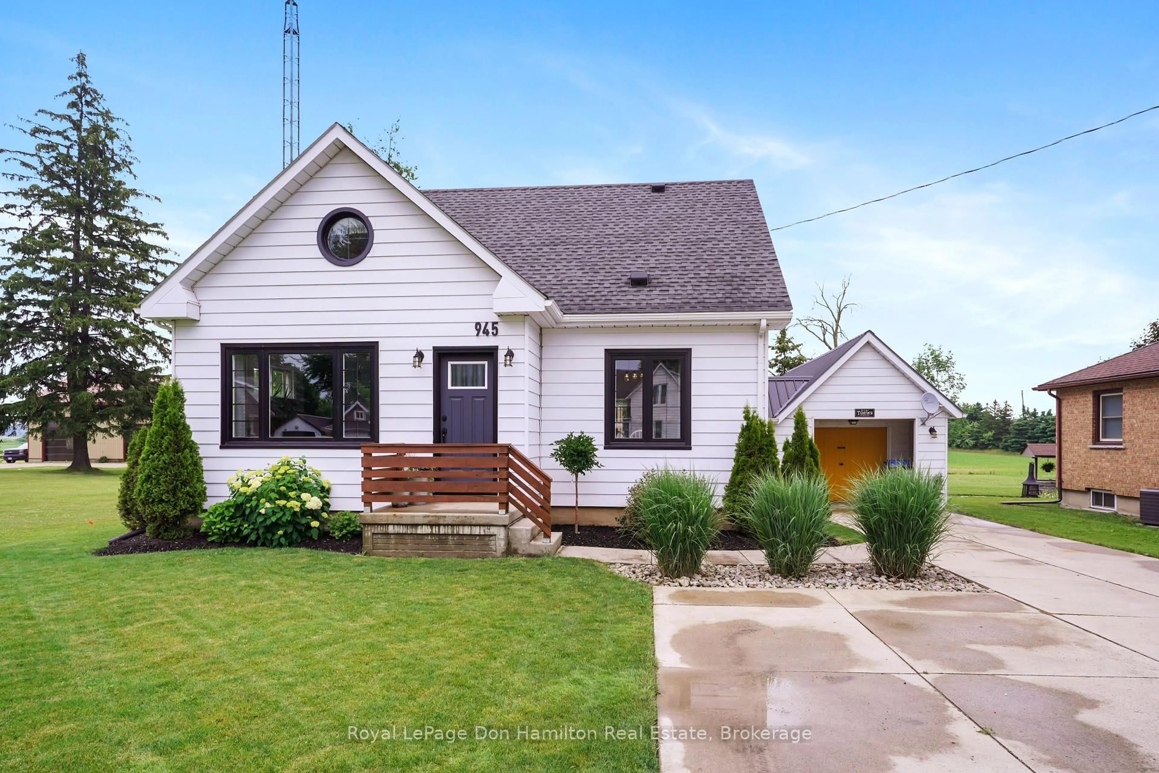 Home with vinyl exterior material, street for 945 Main Street, North Perth Ontario N4W 3L2