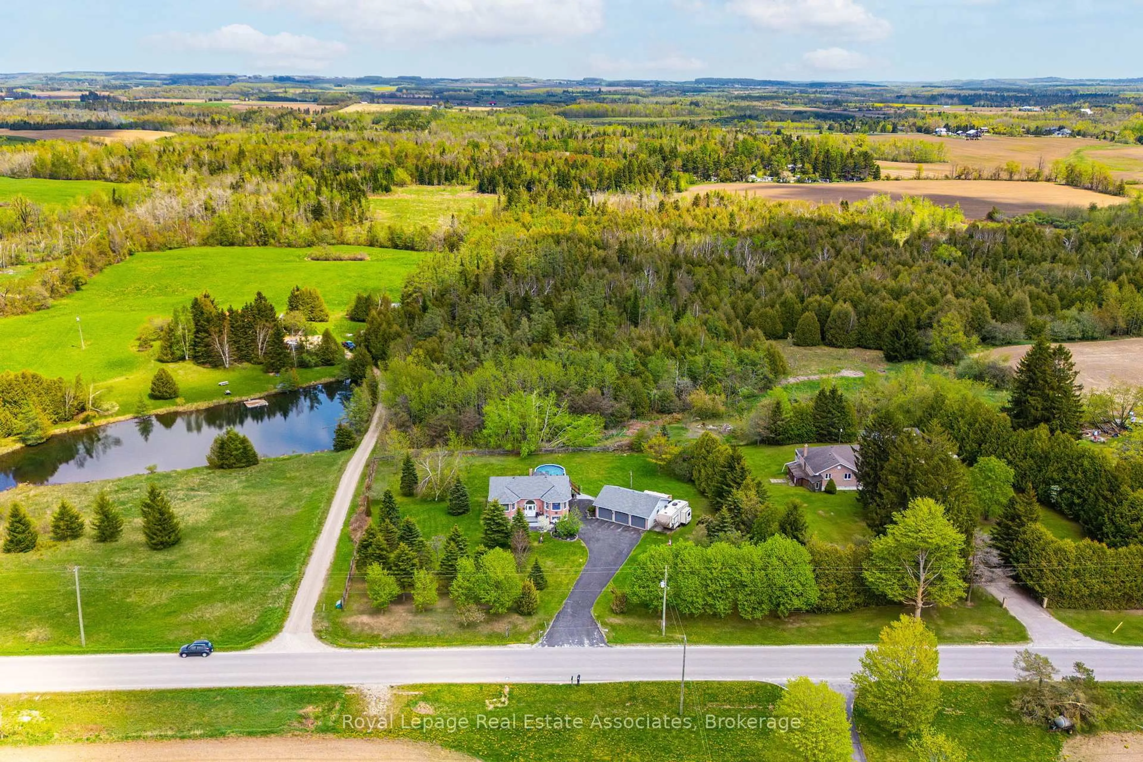 A pic from outside/outdoor area/front of a property/back of a property/a pic from drone, water/lake/river/ocean view for 436451 4th Line, Melancthon Ontario L9V 1S6