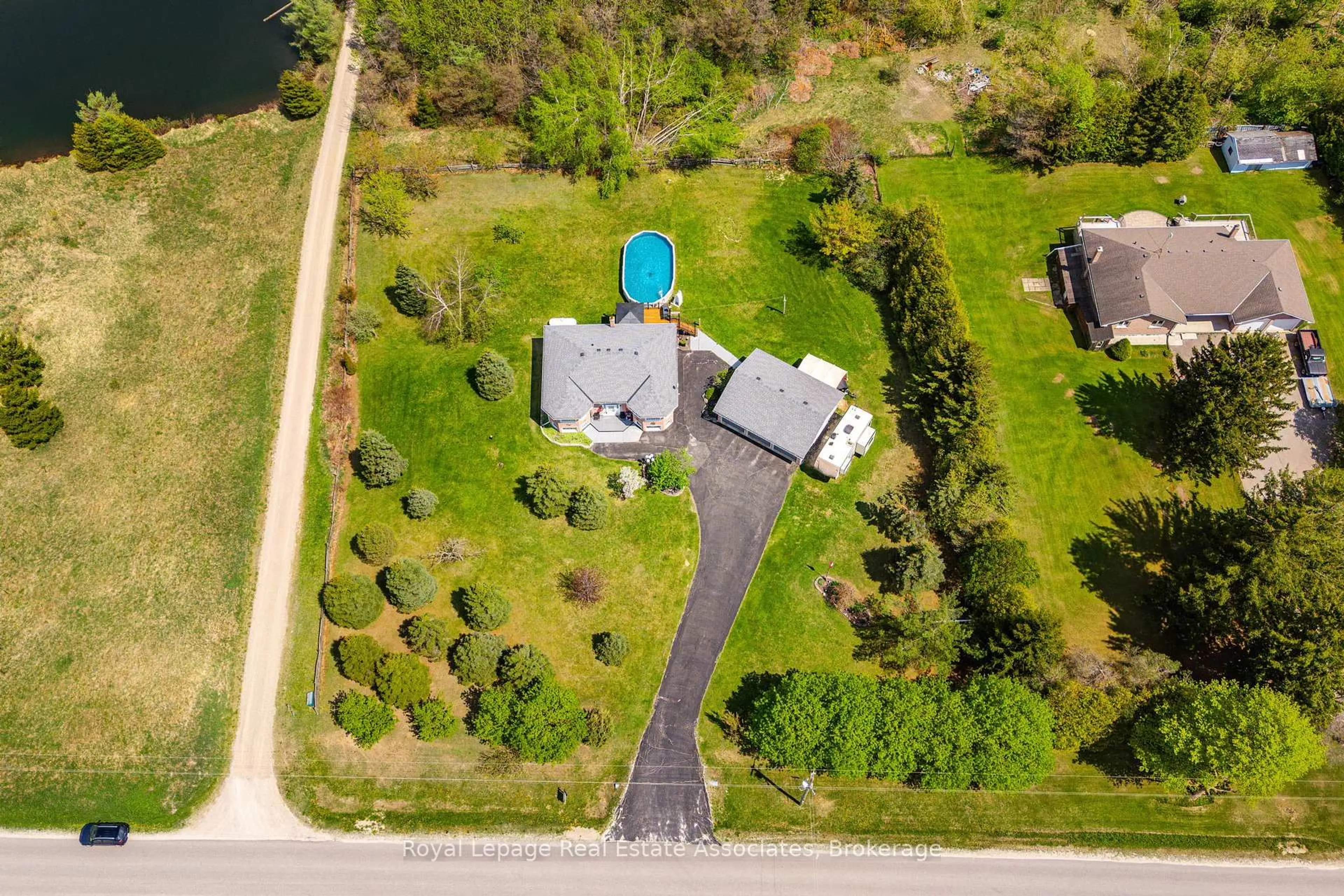 A pic from outside/outdoor area/front of a property/back of a property/a pic from drone, water/lake/river/ocean view for 436451 4th Line, Melancthon Ontario L9V 1S6