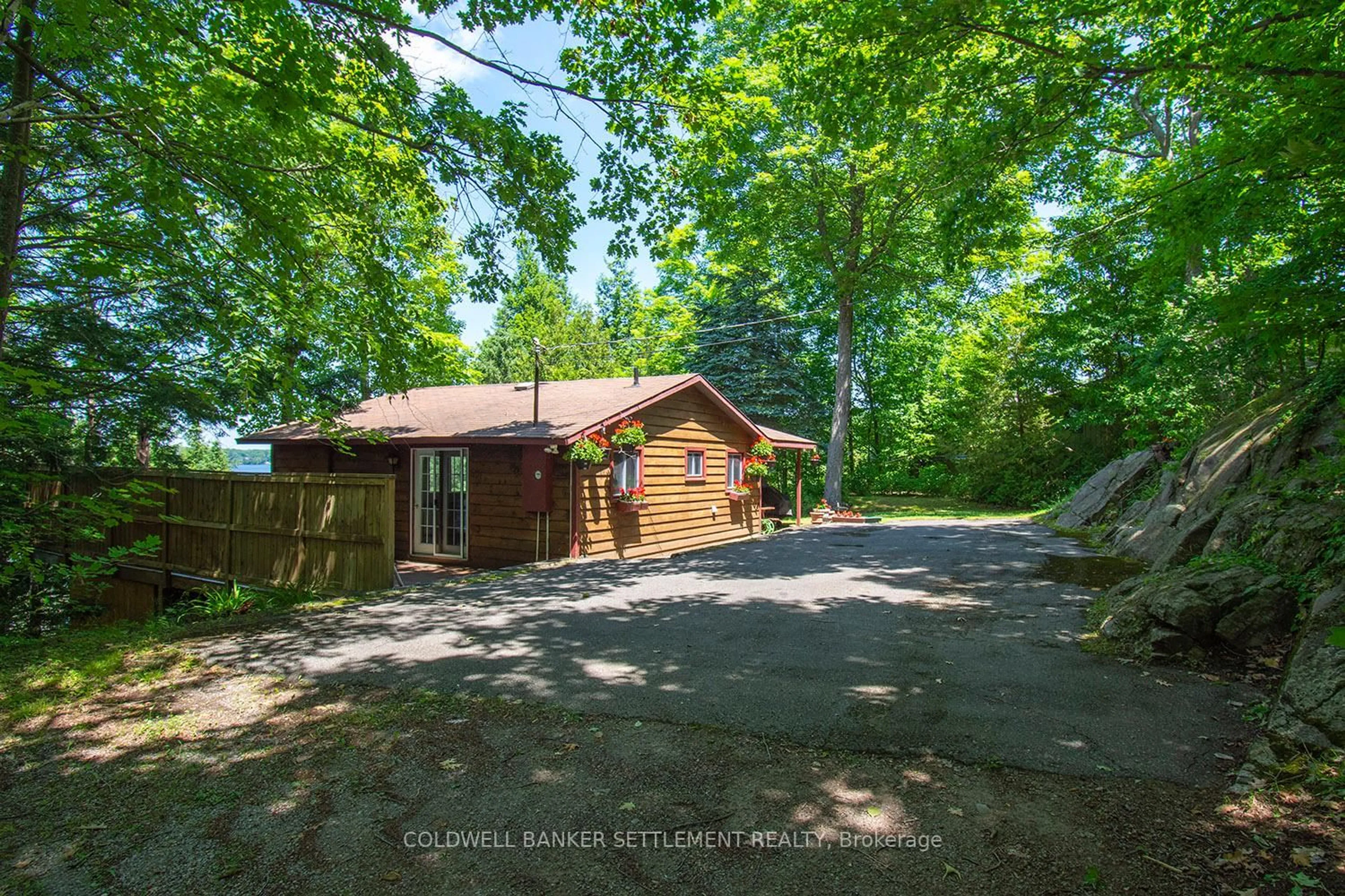 A pic from outside/outdoor area/front of a property/back of a property/a pic from drone, unknown for 1136C Northview Lane, Sharbot Lake Ontario K0H 2P0