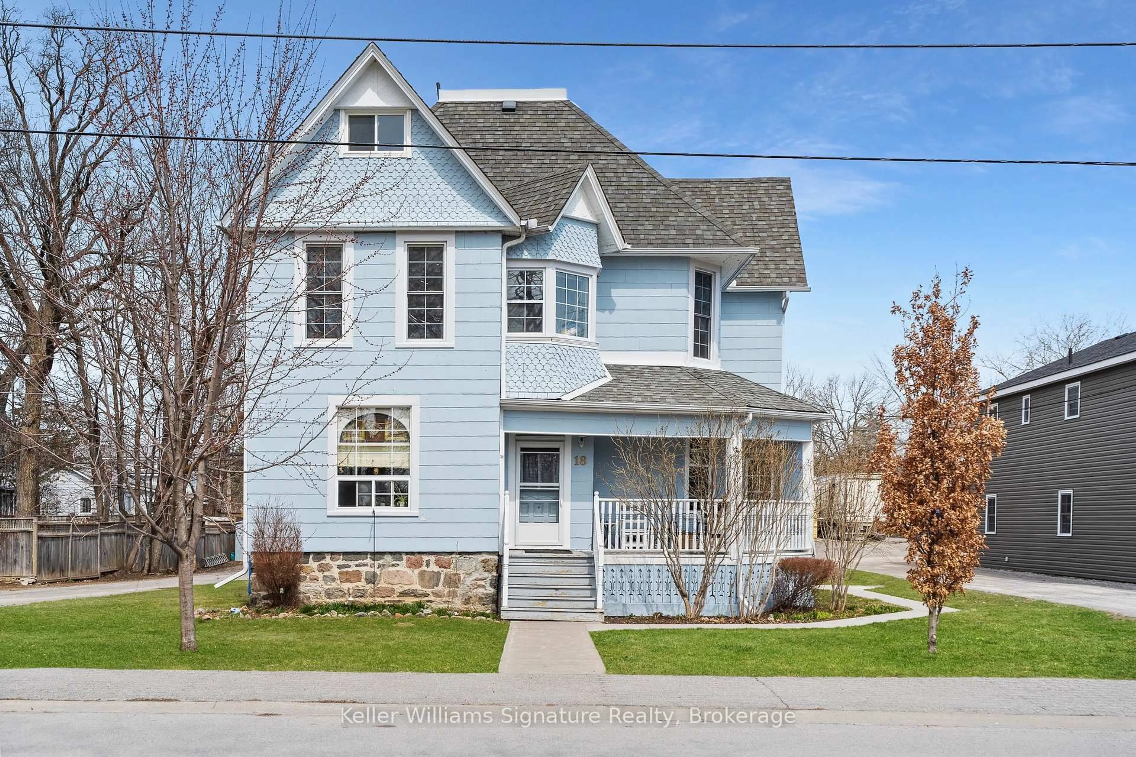 Home with vinyl exterior material, street for 18 Oak St, Kawartha Lakes Ontario K0M 1N0