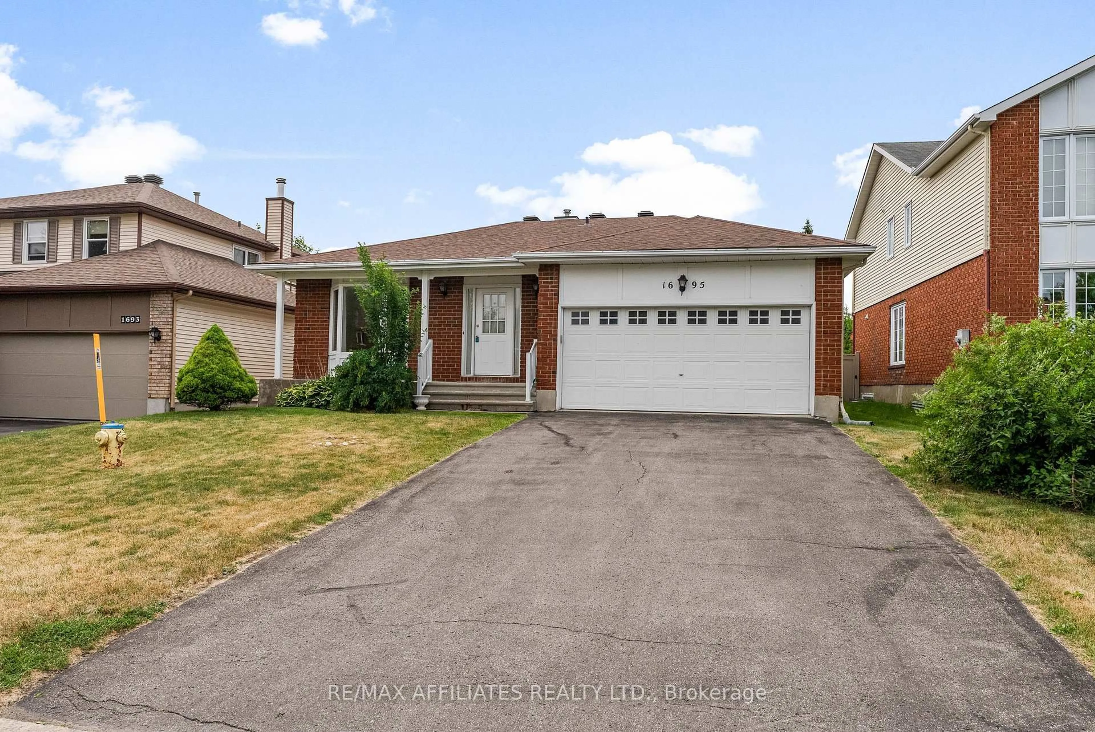 Home with brick exterior material, street for 1695 Caminiti Cres, Orleans Ontario K4A 1L7