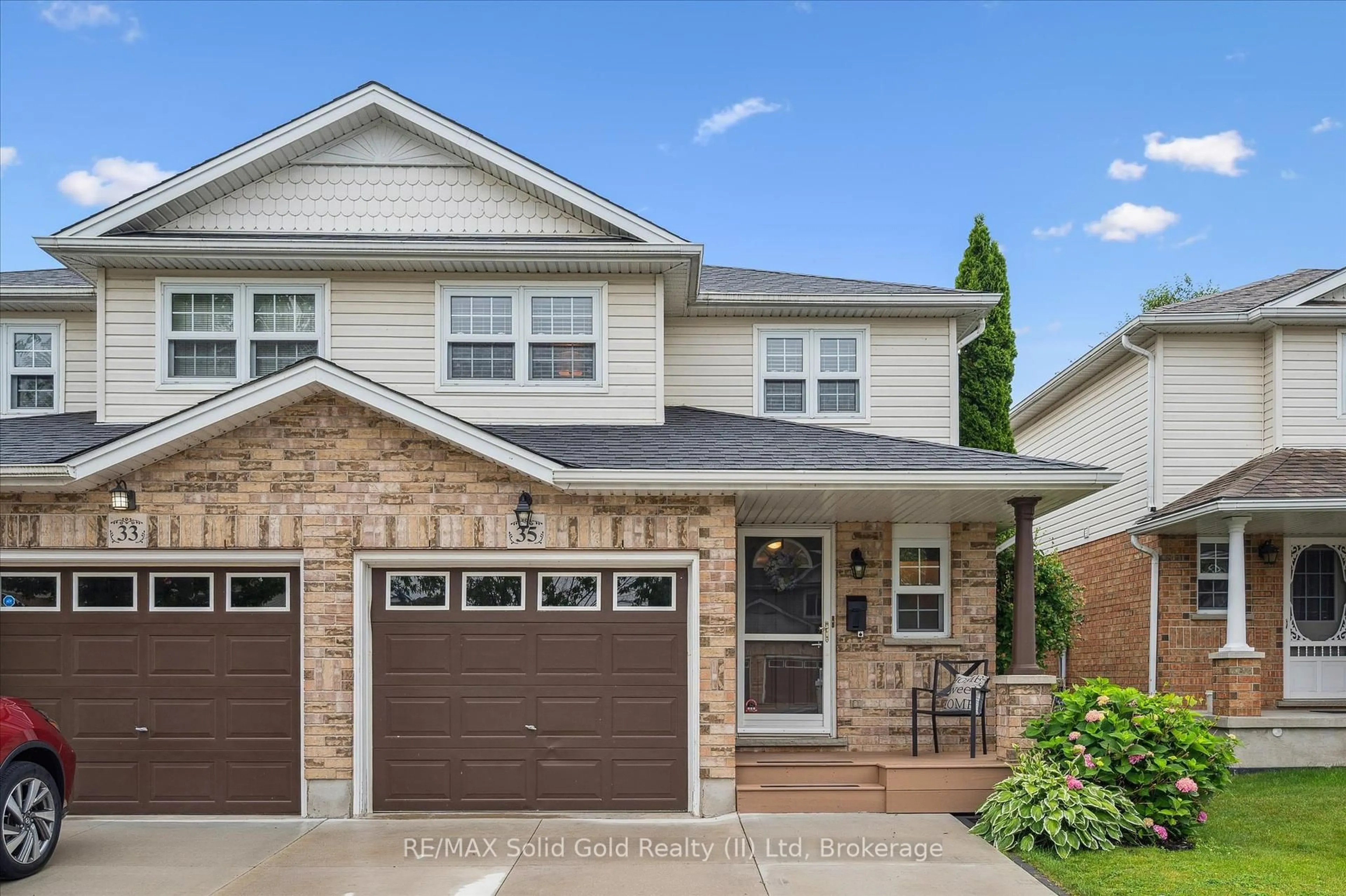 Home with brick exterior material, street for 35 Watercress Crt, Kitchener Ontario N2E 3S8