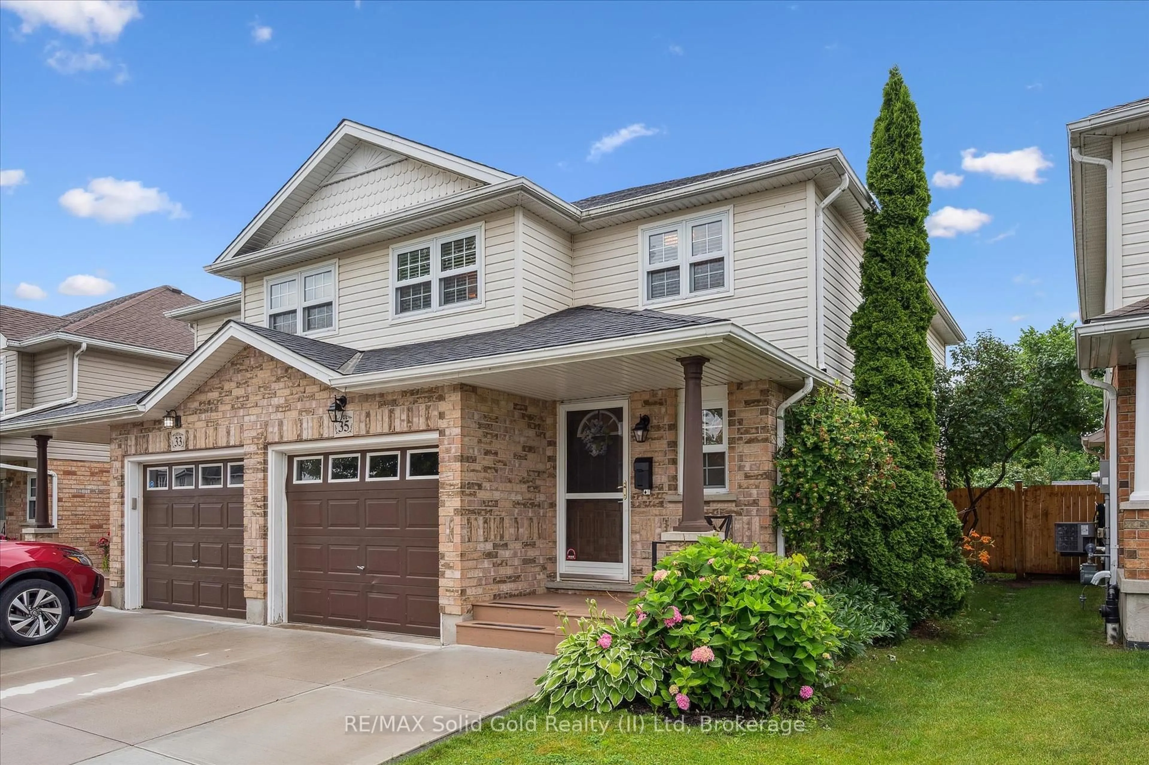 Home with brick exterior material, street for 35 Watercress Crt, Kitchener Ontario N2E 3S8