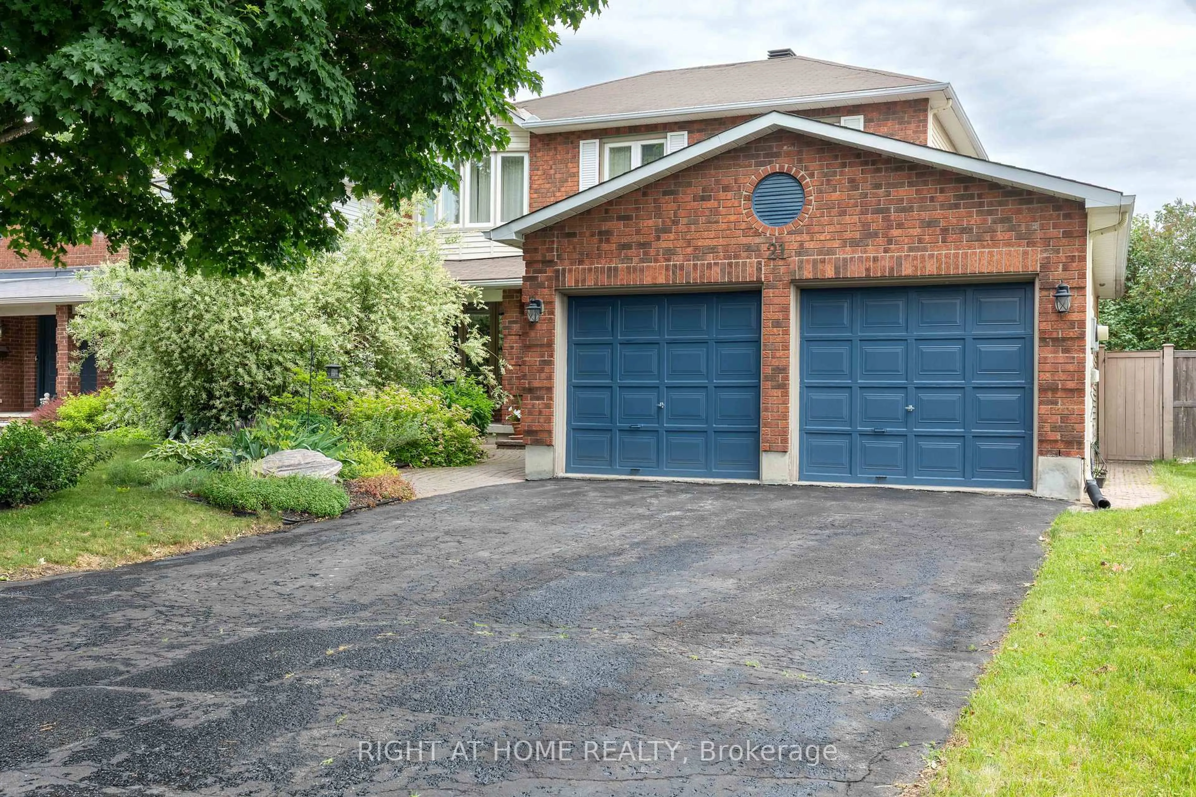 Home with brick exterior material, street for 21 Hime Cres, Ottawa Ontario K1G 4S1