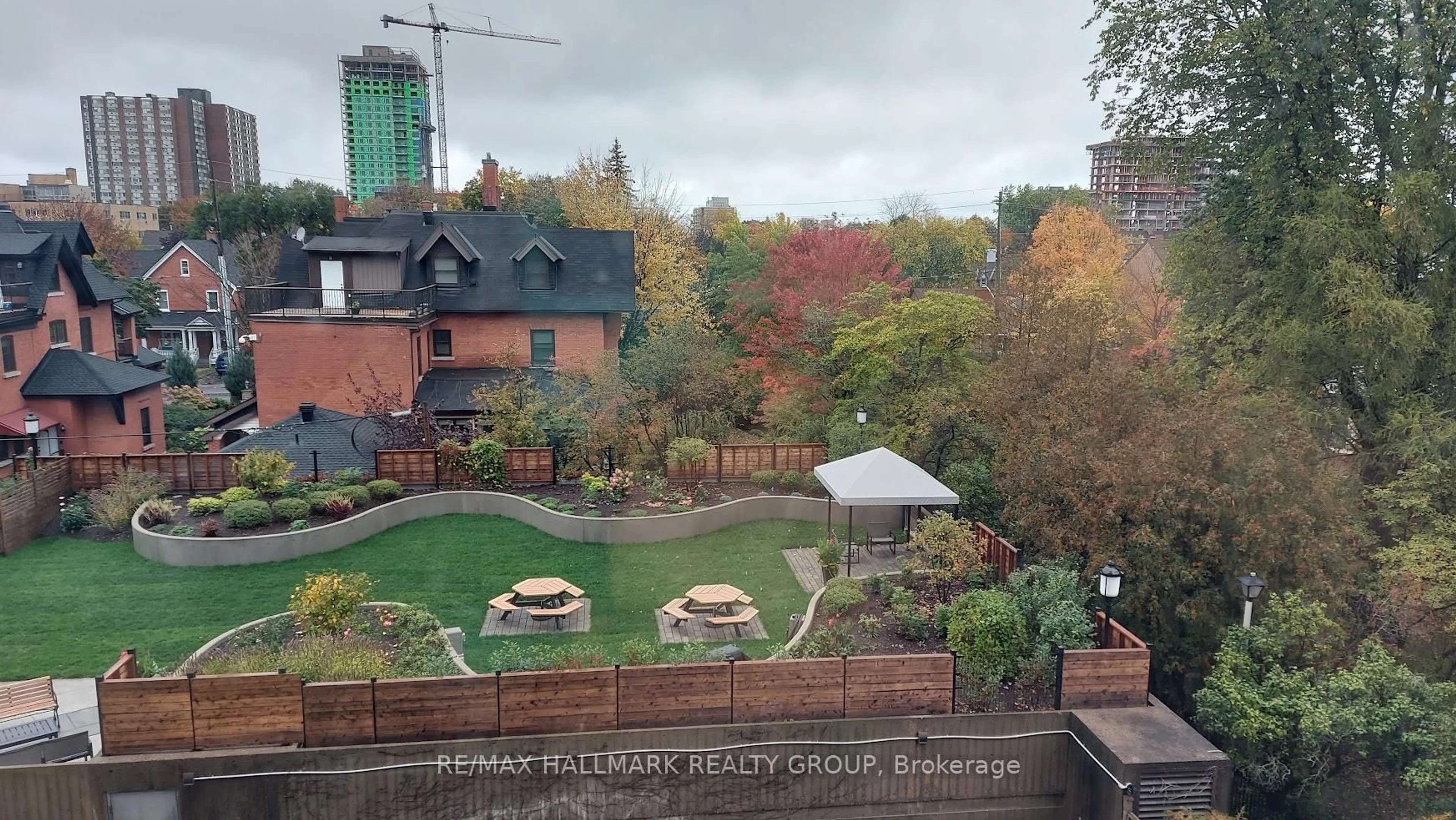 A pic from outside/outdoor area/front of a property/back of a property/a pic from drone, city buildings view from balcony for 373 Laurier Ave #402, Ottawa Ontario K1N 8X6