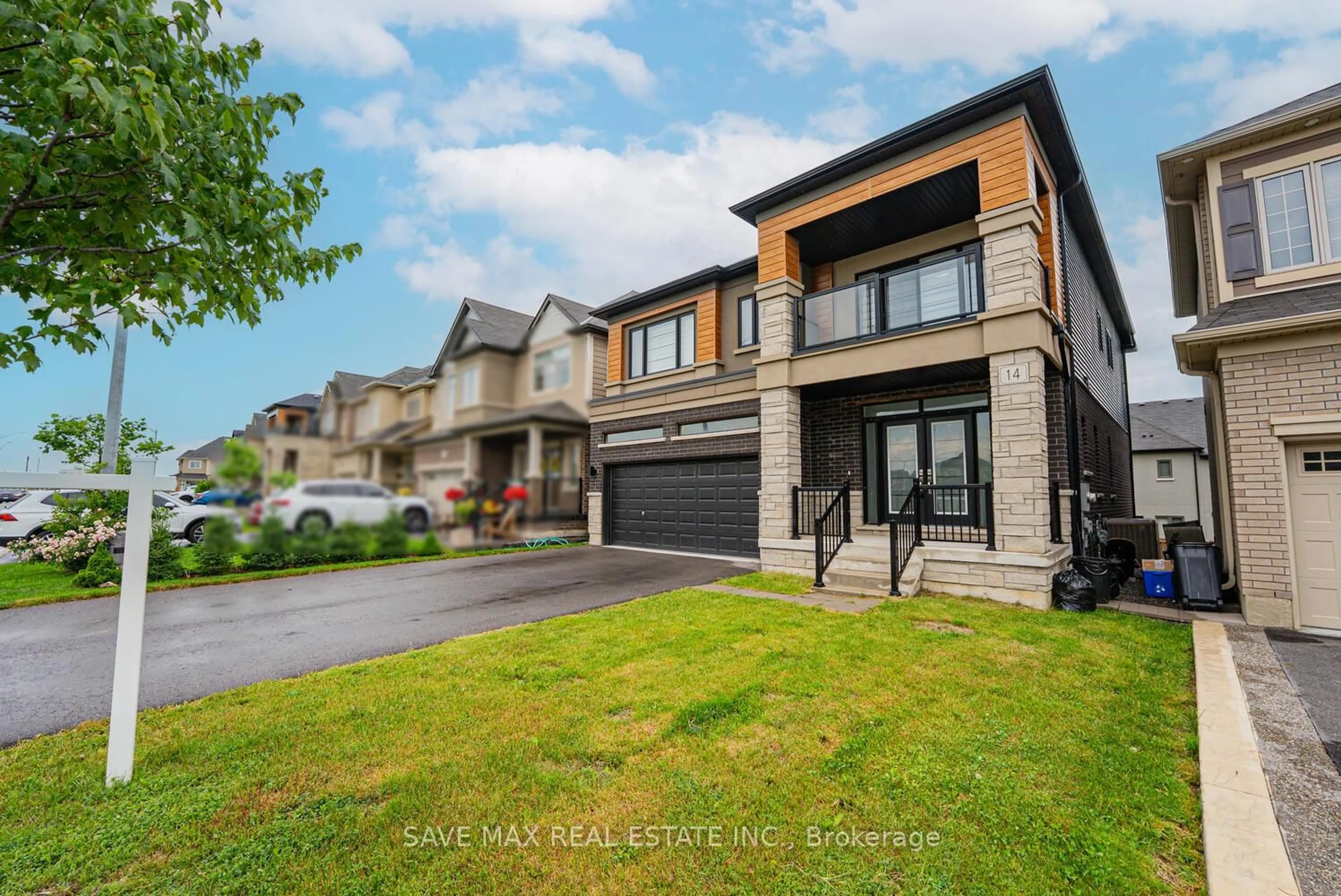 Home with brick exterior material, street for 14 Doug Foulds Way, Brant Ontario N3L 0K2