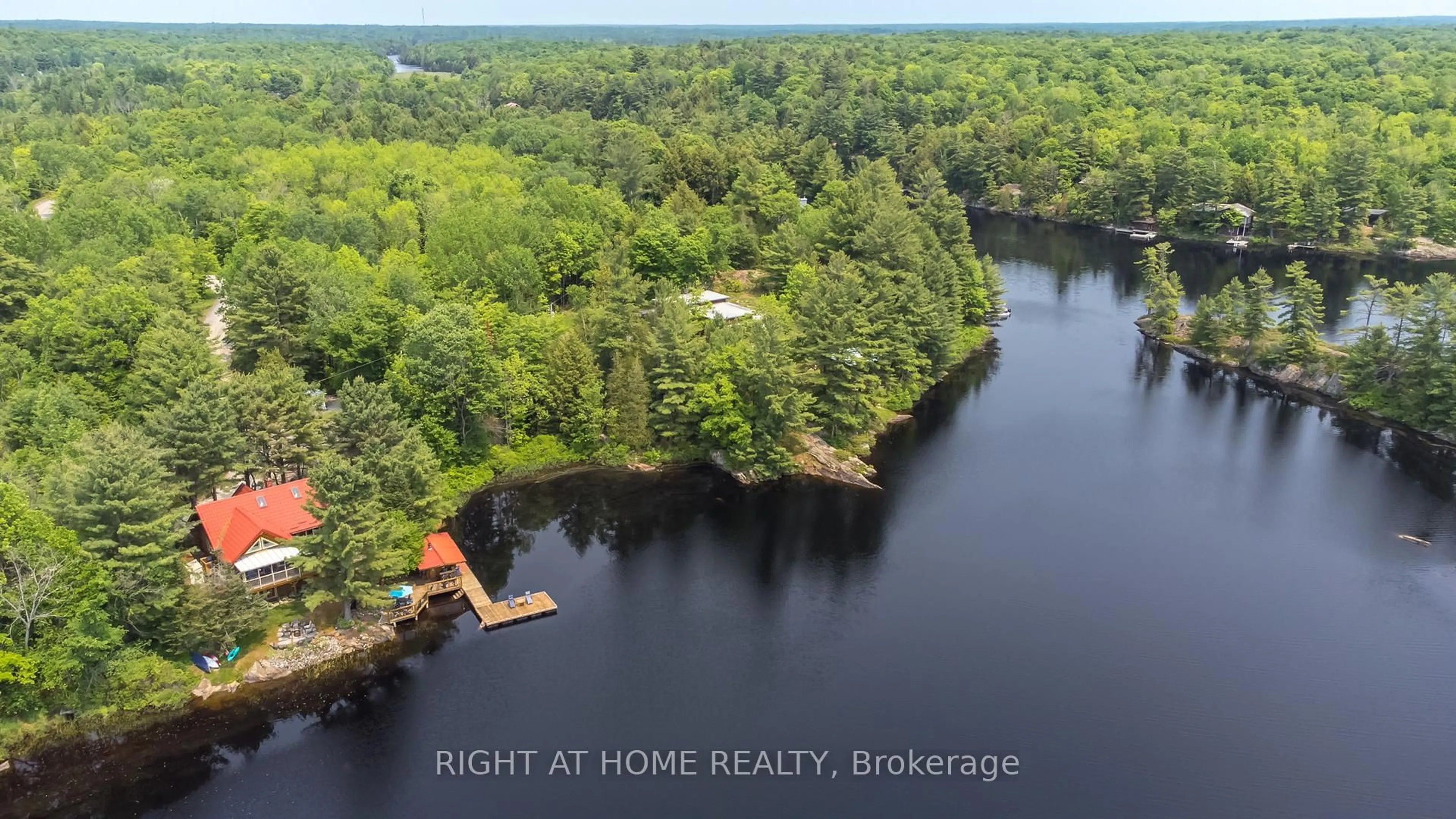 A pic from outside/outdoor area/front of a property/back of a property/a pic from drone, water/lake/river/ocean view for 235 LOCH ERNE Rd, McDougall Ontario P2A 2W7