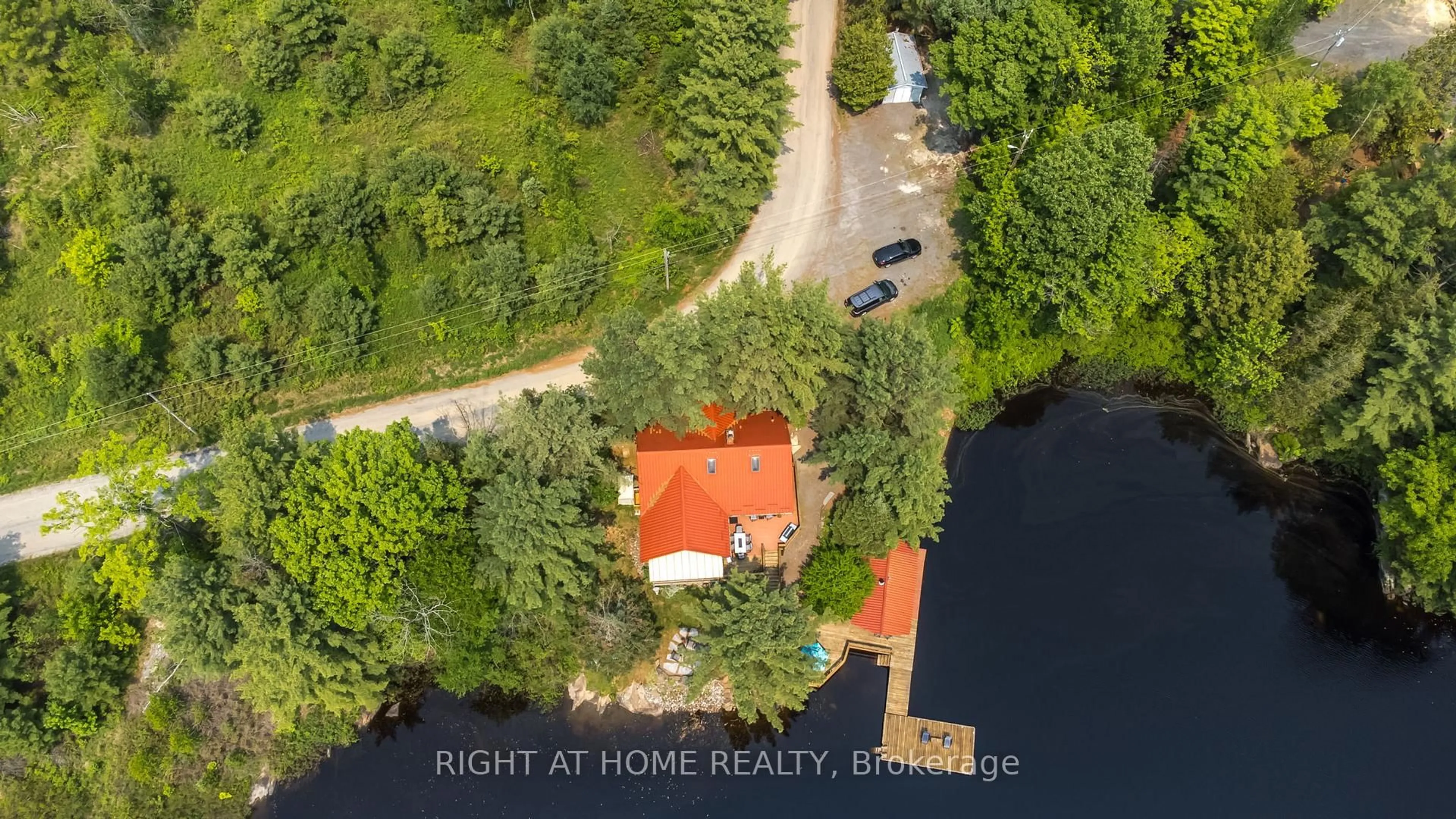 A pic from outside/outdoor area/front of a property/back of a property/a pic from drone, water/lake/river/ocean view for 235 LOCH ERNE Rd, McDougall Ontario P2A 2W7