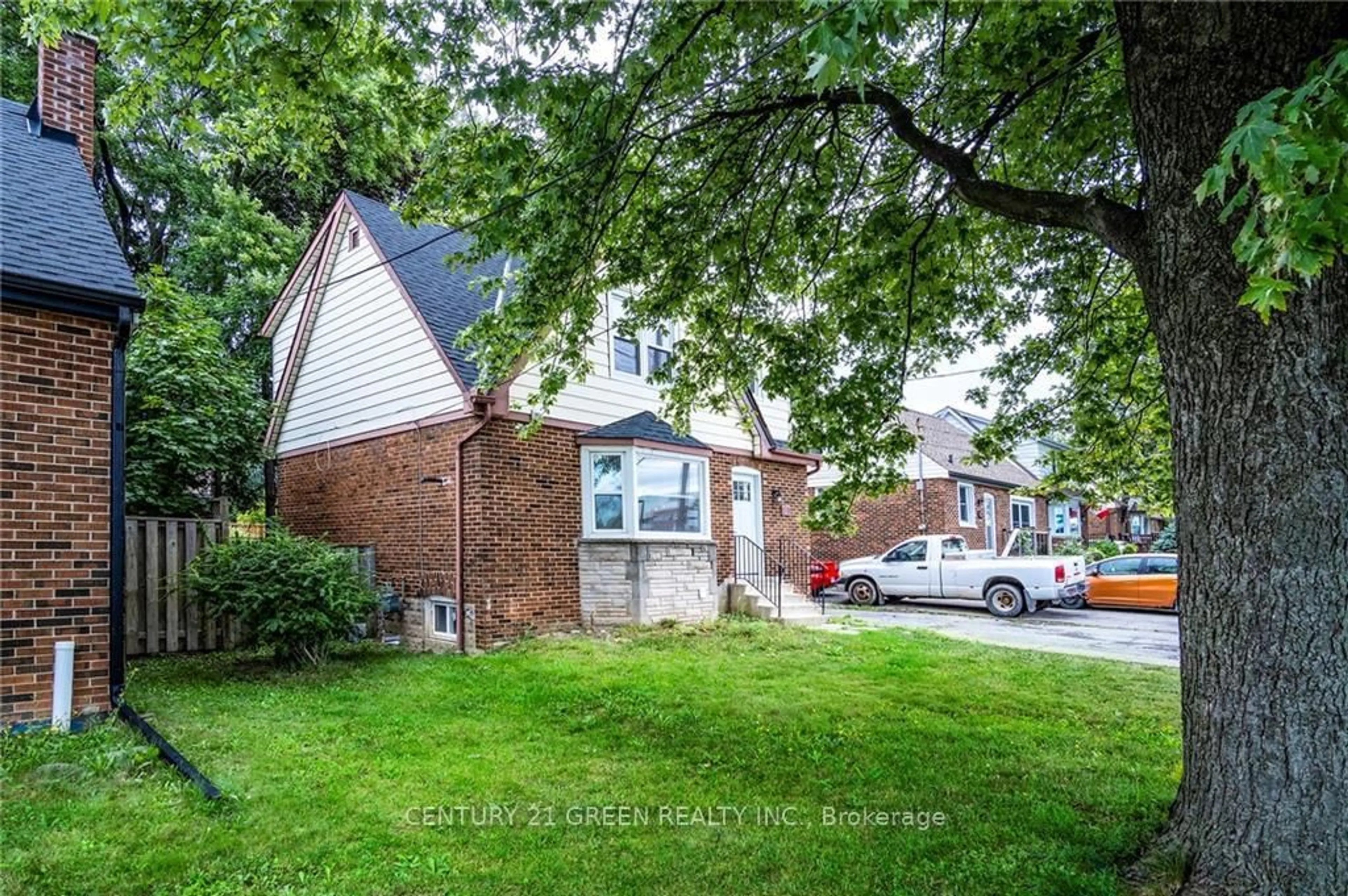 Home with brick exterior material, street for 87 West 5th St, Hamilton Ontario L9C 3N5