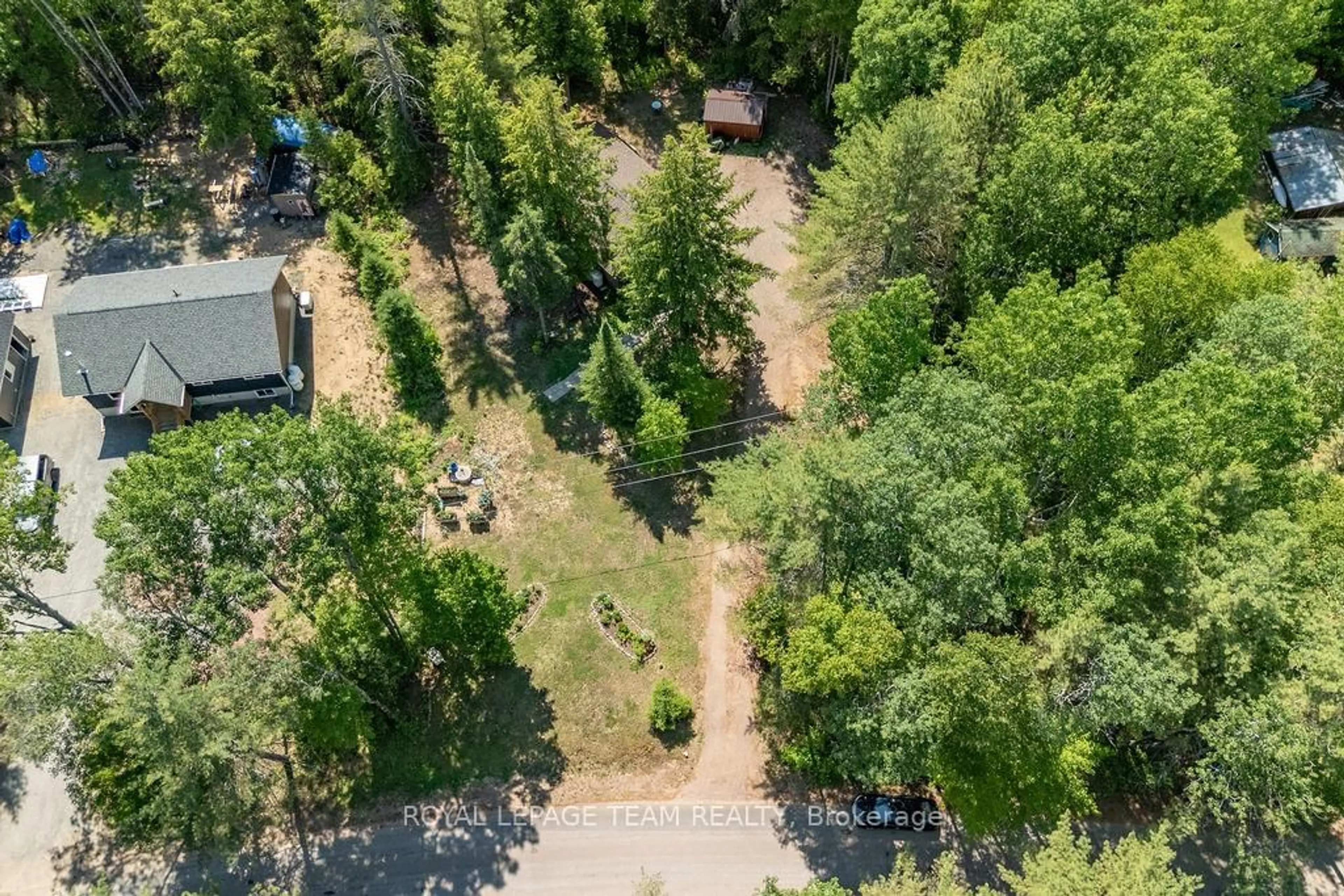 A pic from outside/outdoor area/front of a property/back of a property/a pic from drone, forest/trees view for 383 Ohio Rd, Combermere Ontario K0J 1L0