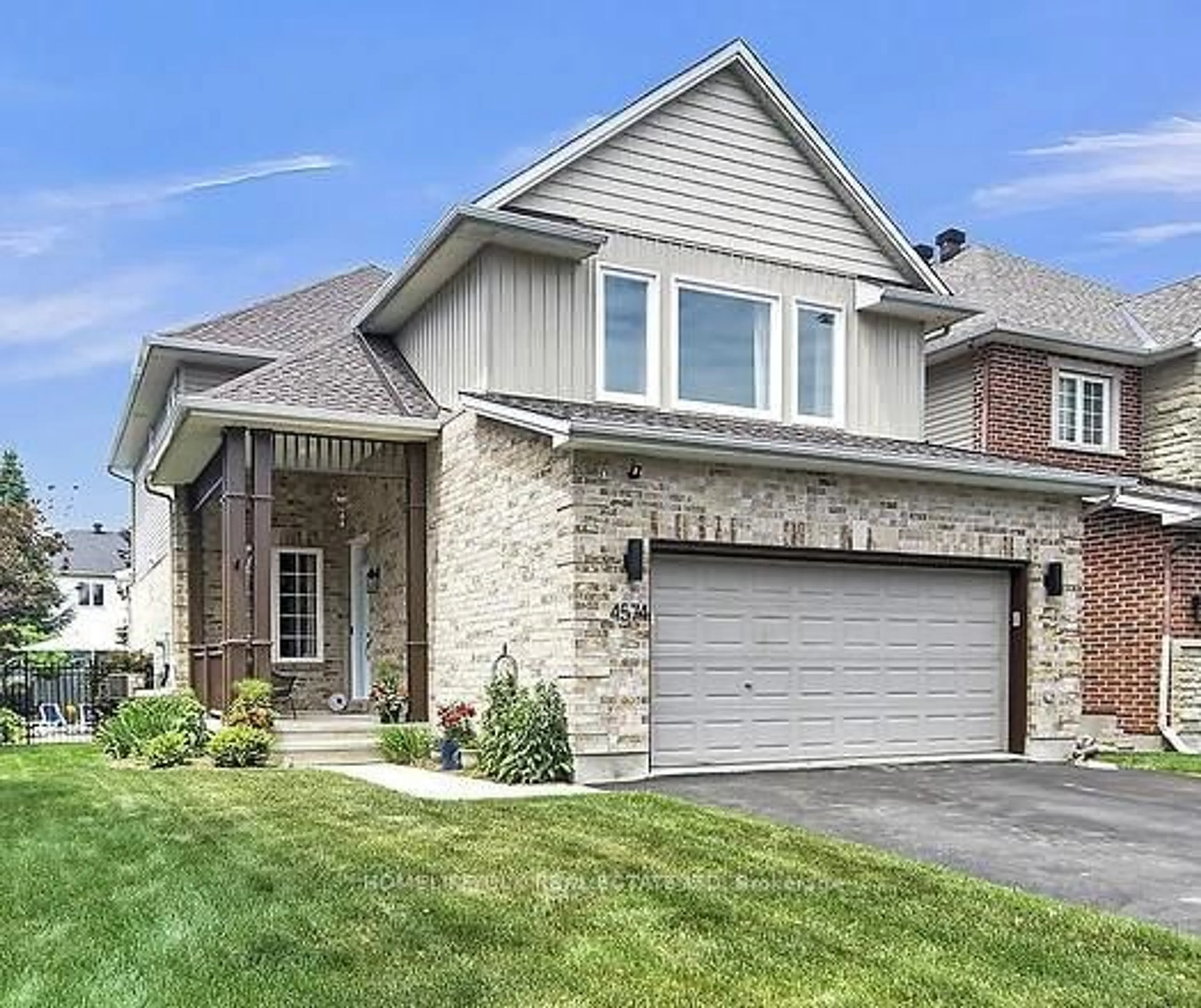 Home with brick exterior material, street for 4574 Sugar Maple Dr, Ottawa Ontario K1V 1Y4