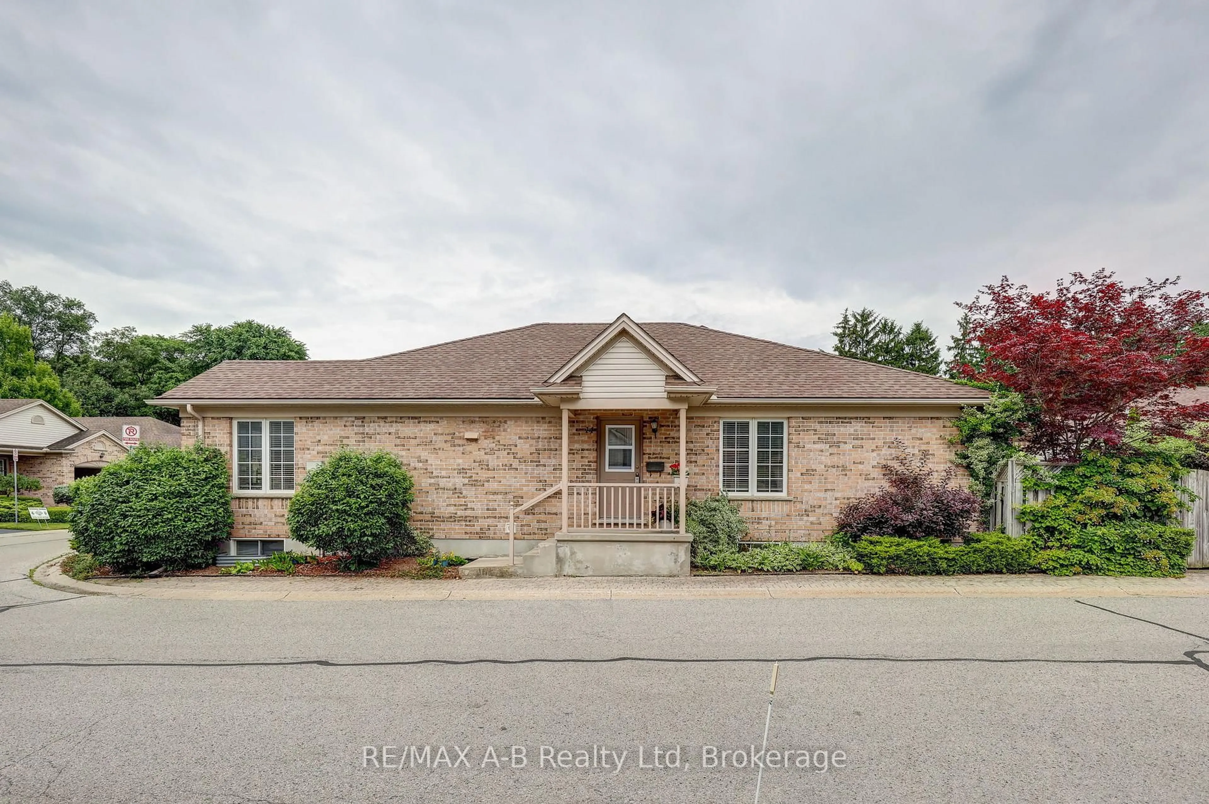 Home with brick exterior material, street for 567 Fanshawe Park Rd #14, London North Ontario N5X 3T4