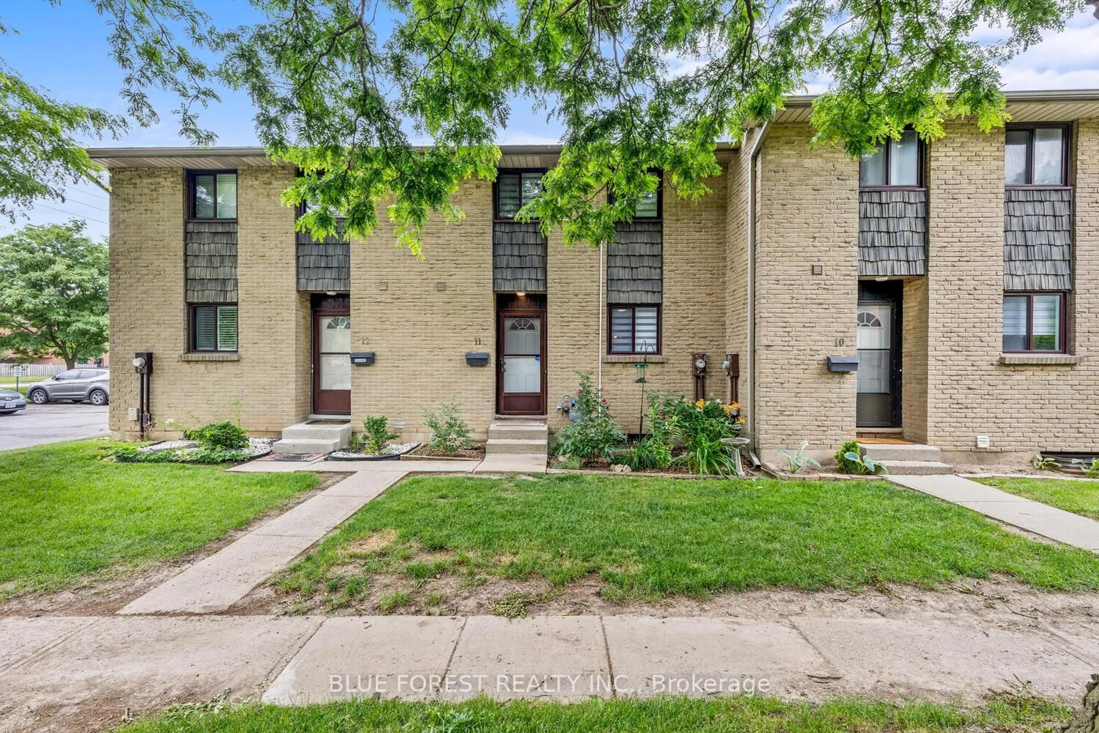 Home with brick exterior material, street for 460 Southdale Rd #11, London South Ontario N6E 1A4