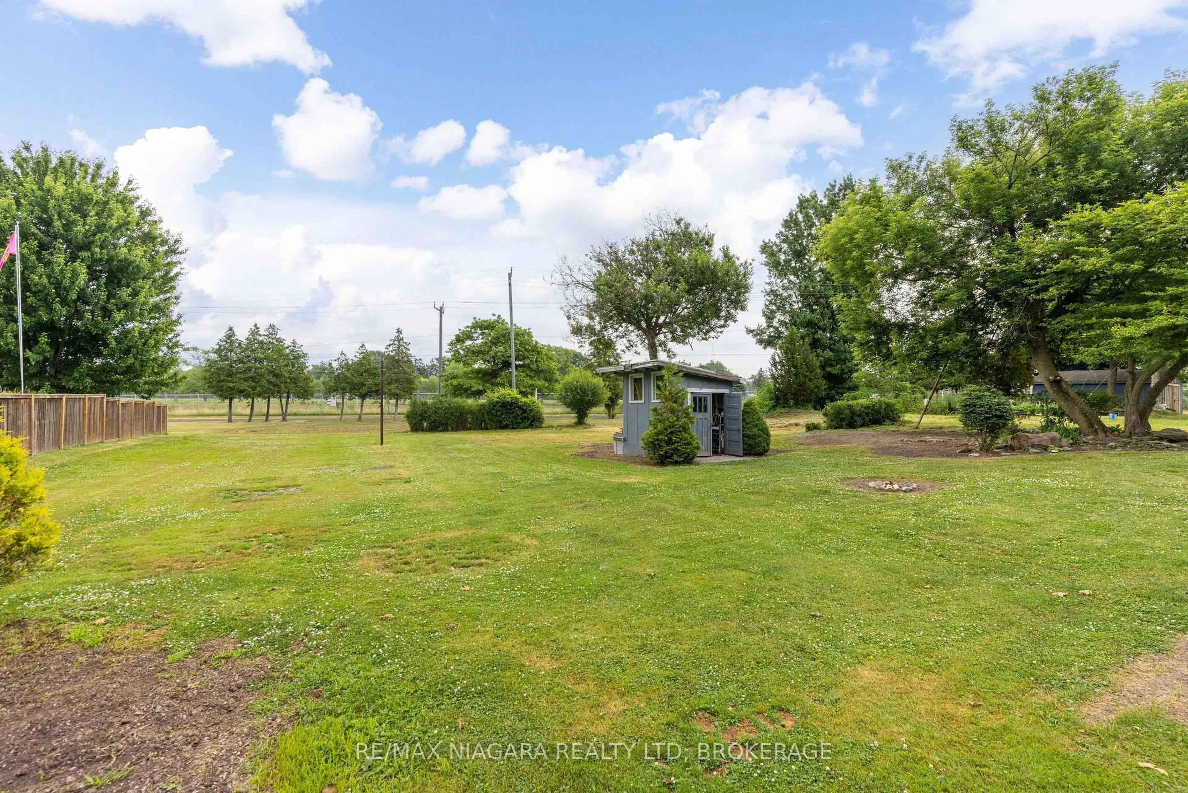 A pic from outside/outdoor area/front of a property/back of a property/a pic from drone, forest/trees view for 45 Ramey Ave, Port Colborne Ontario L3K 2L2