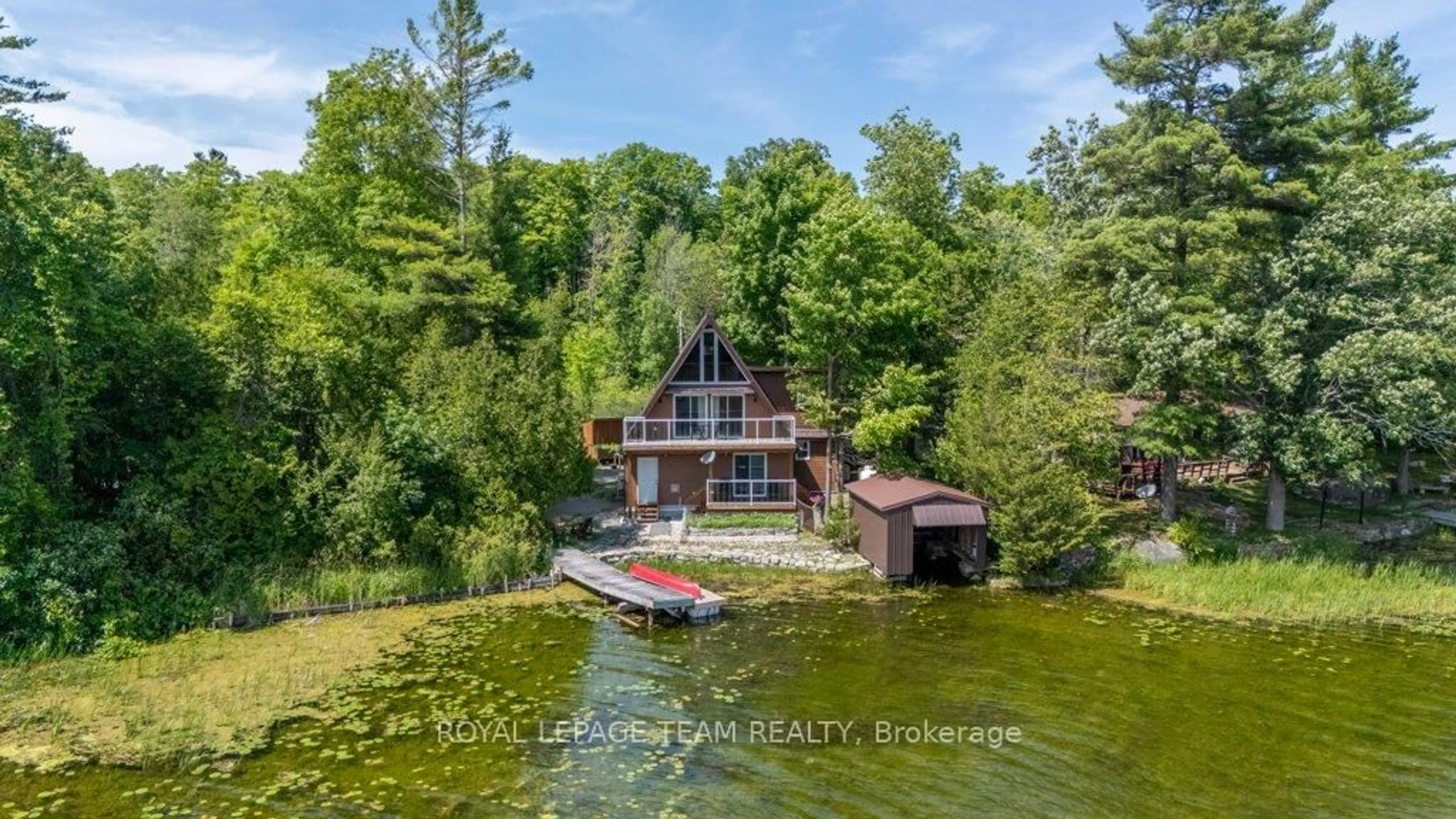 A pic from outside/outdoor area/front of a property/back of a property/a pic from drone, water/lake/river/ocean view for 304 Hay Bay Lane, Leeds and the Thousand Islands Ontario K0E 1L0