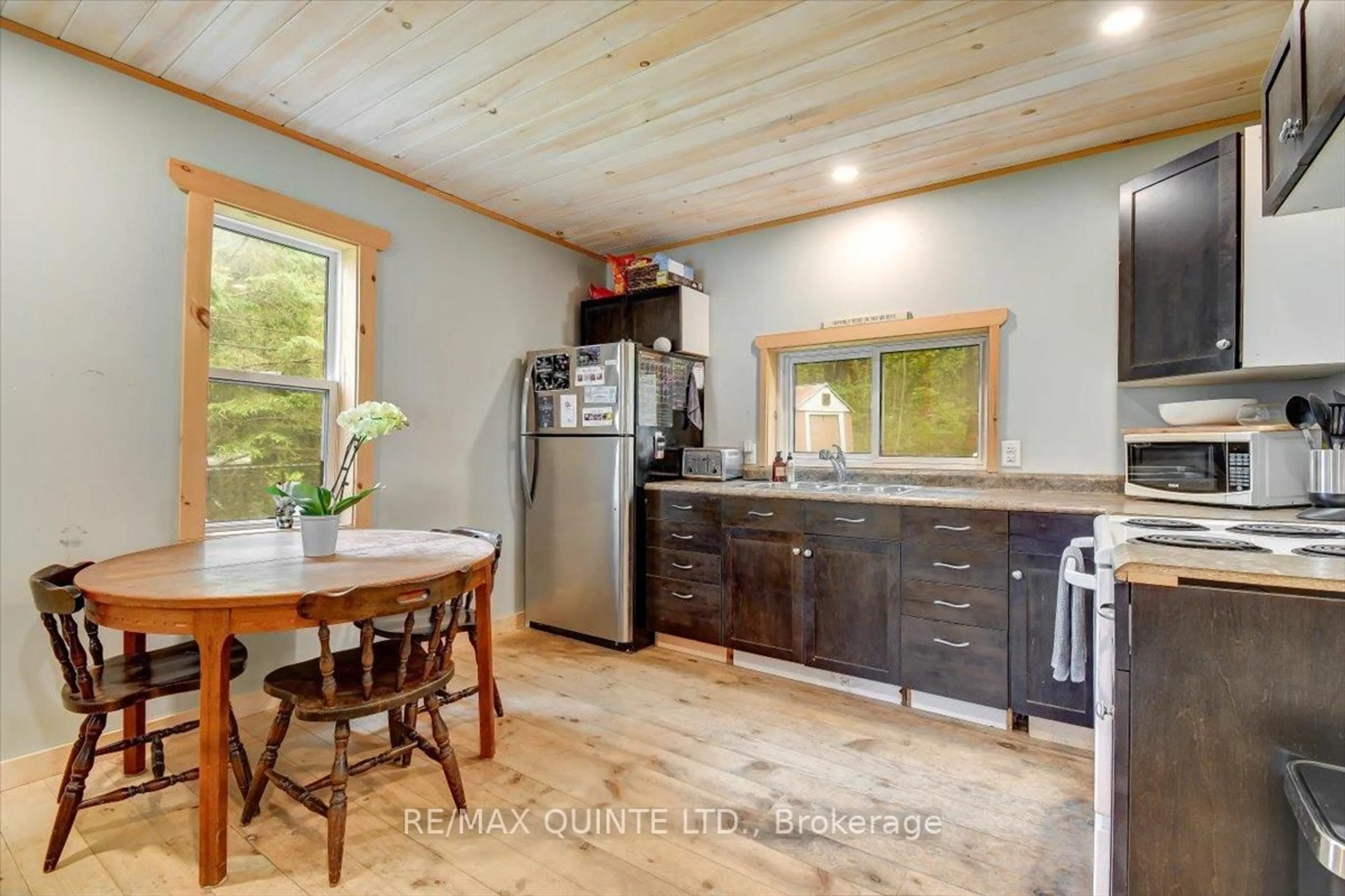 Open concept kitchen, wood/laminate floor for 172 County Road 504 Rd, North Kawartha Ontario K0L 1A0