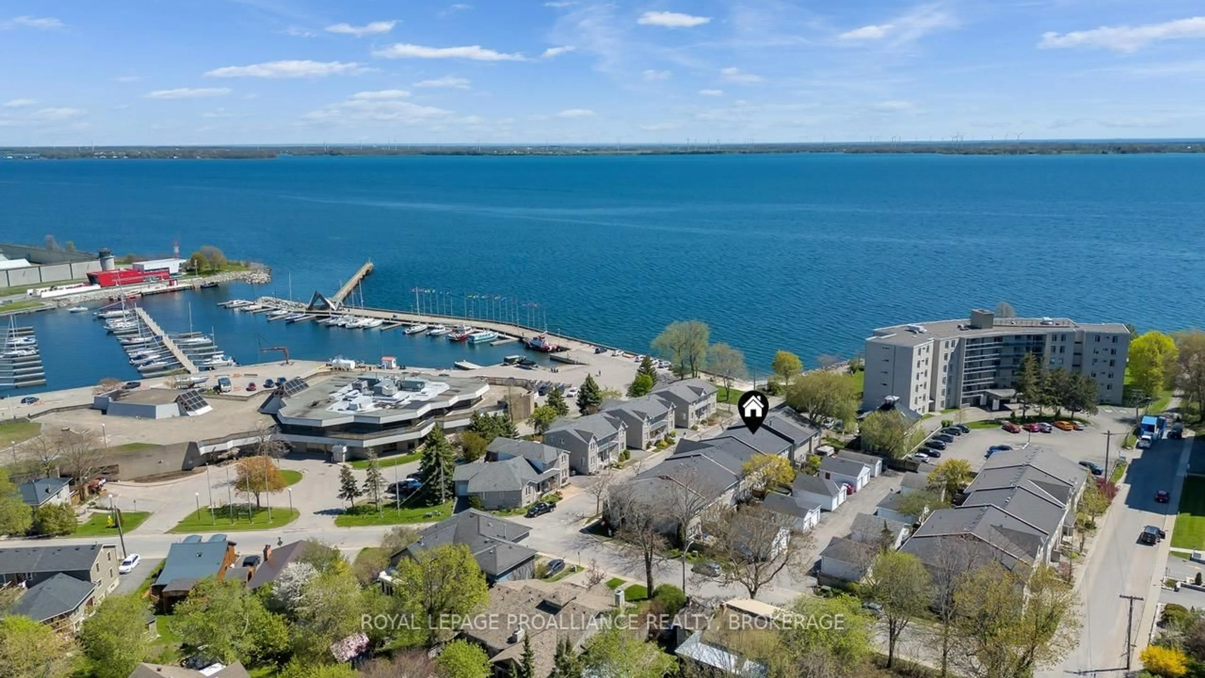 A pic from outside/outdoor area/front of a property/back of a property/a pic from drone, water/lake/river/ocean view for 30 Yonge St, Kingston Ontario K7M 1E3