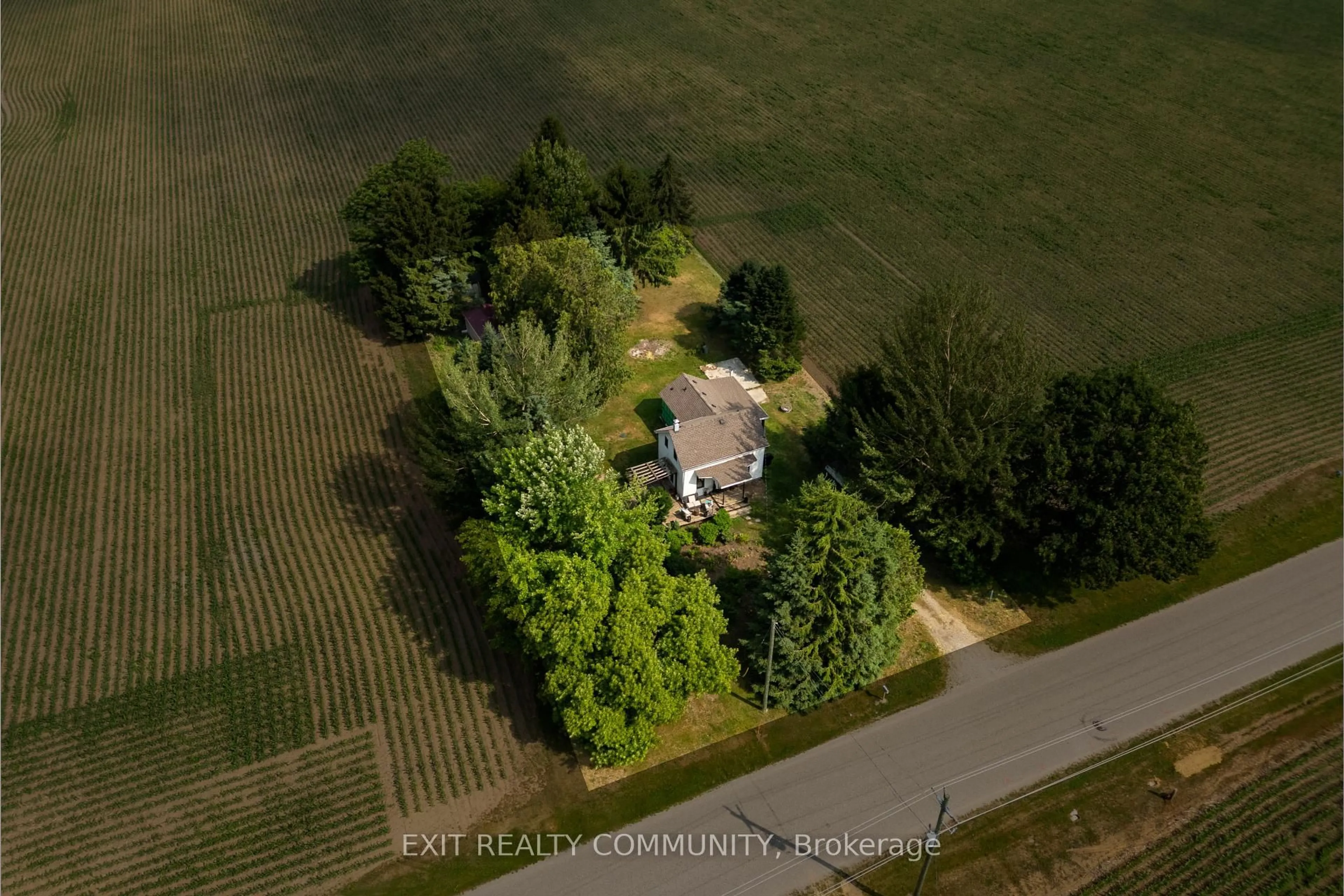 A pic from outside/outdoor area/front of a property/back of a property/a pic from drone, unknown for 23866 Marsh Line, West Elgin Ontario N0L 2P0