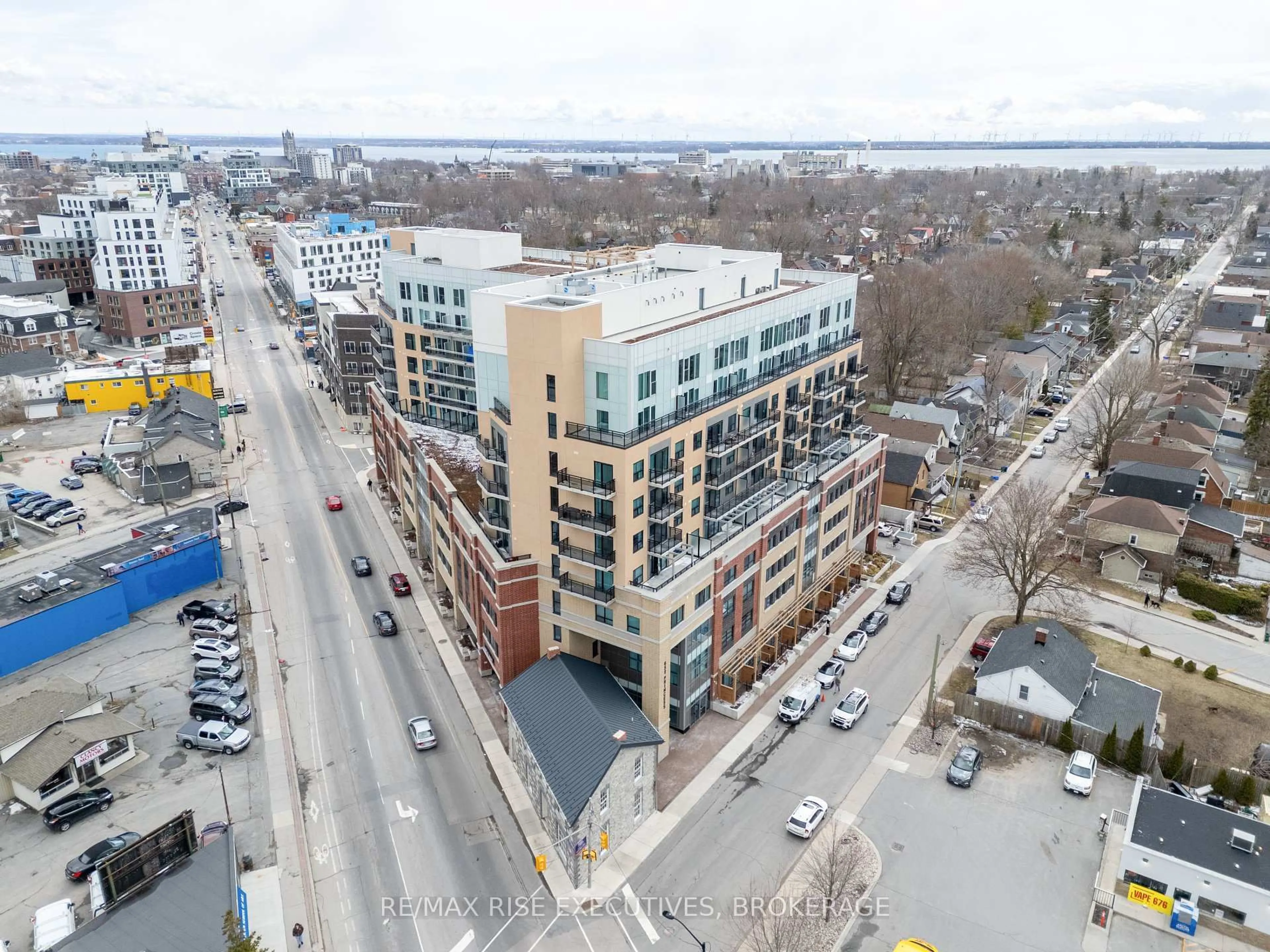 A pic from outside/outdoor area/front of a property/back of a property/a pic from drone, unknown for 652 Princess St #104, Kingston Ontario K7L 3Z9