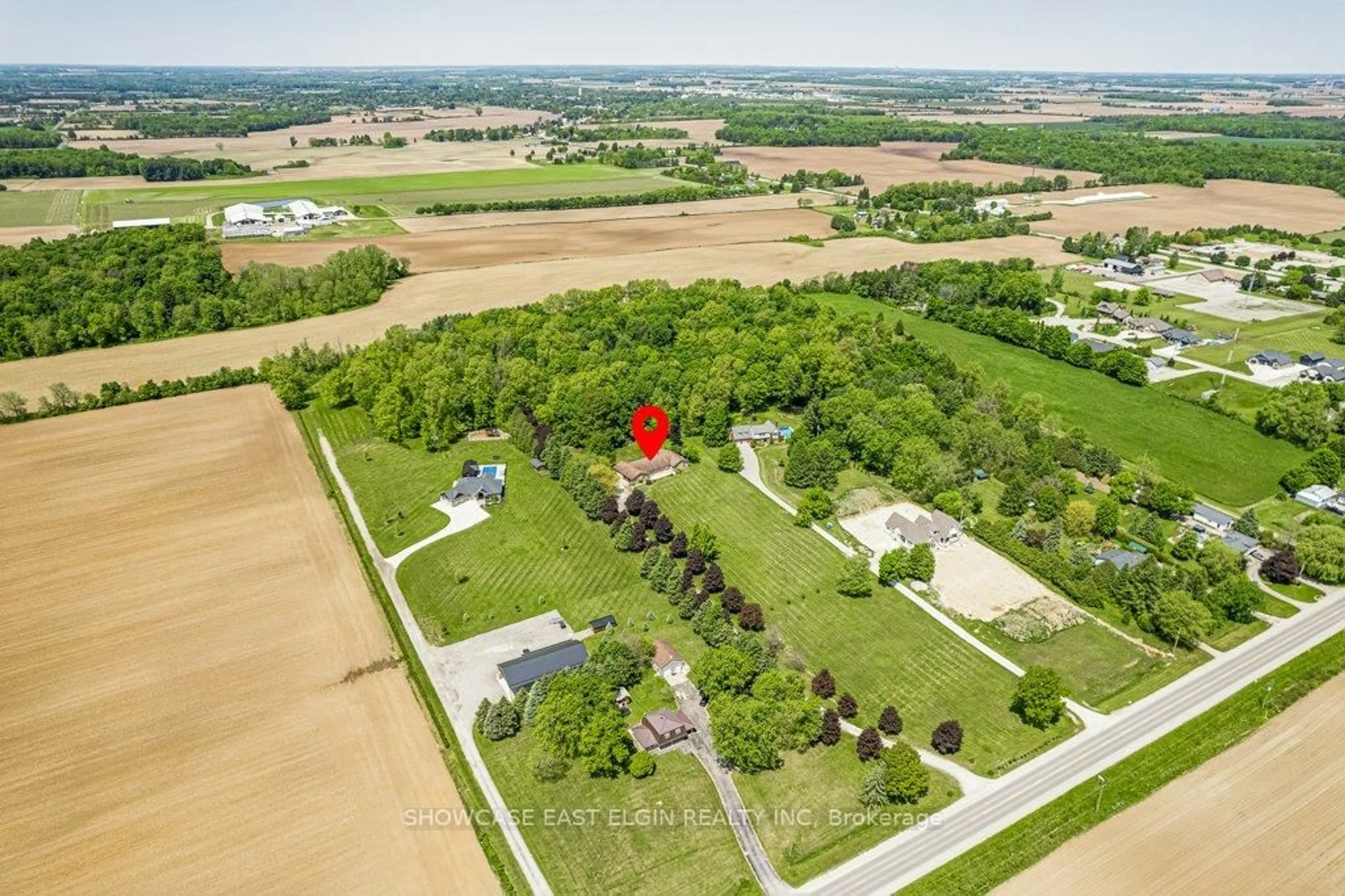 A pic from outside/outdoor area/front of a property/back of a property/a pic from drone, street for 8709 Springfield Rd, Malahide Ontario N5H 2R1