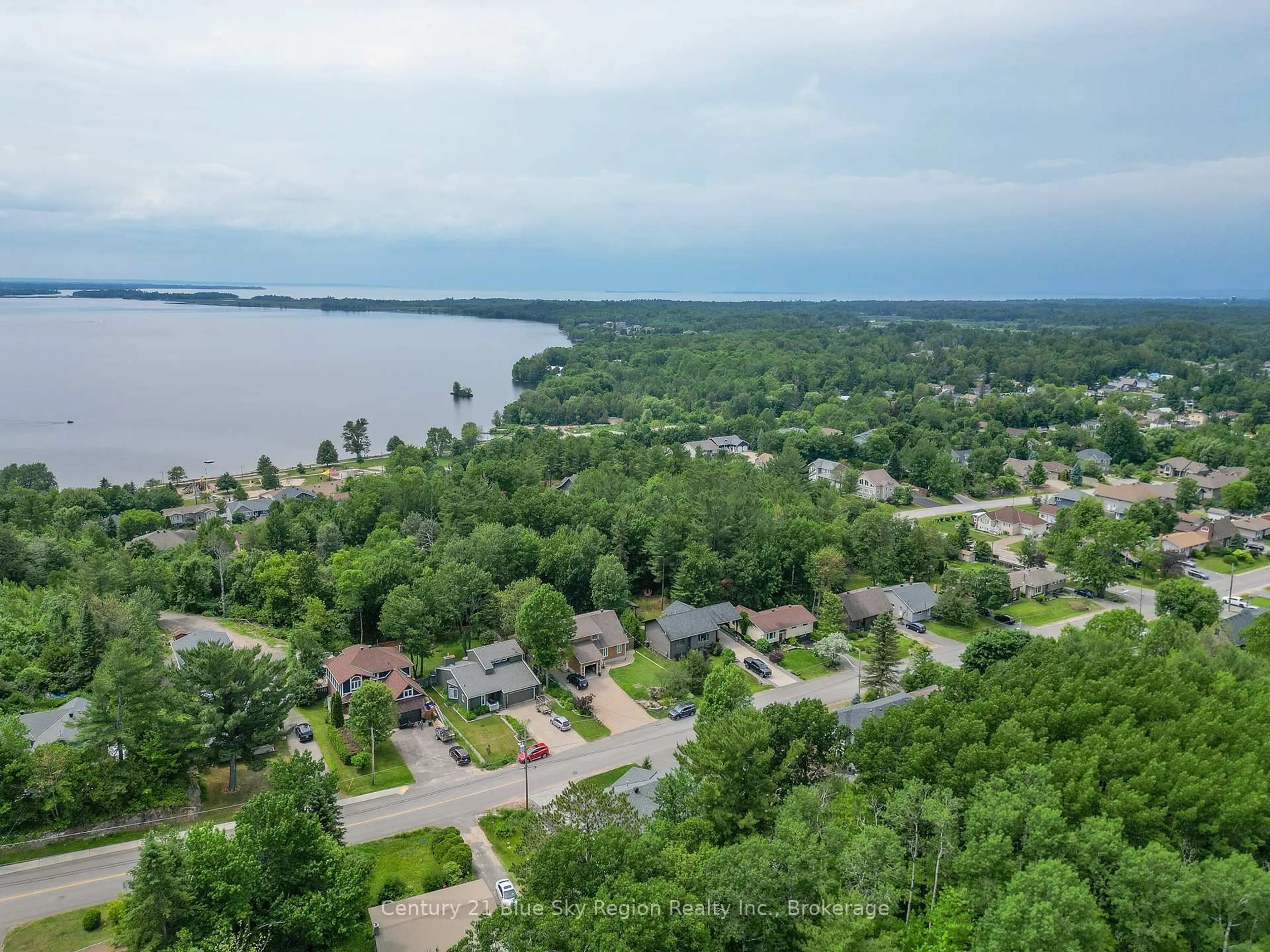 A pic from outside/outdoor area/front of a property/back of a property/a pic from drone, water/lake/river/ocean view for 390 King St, Callander Ontario P0H 1H0