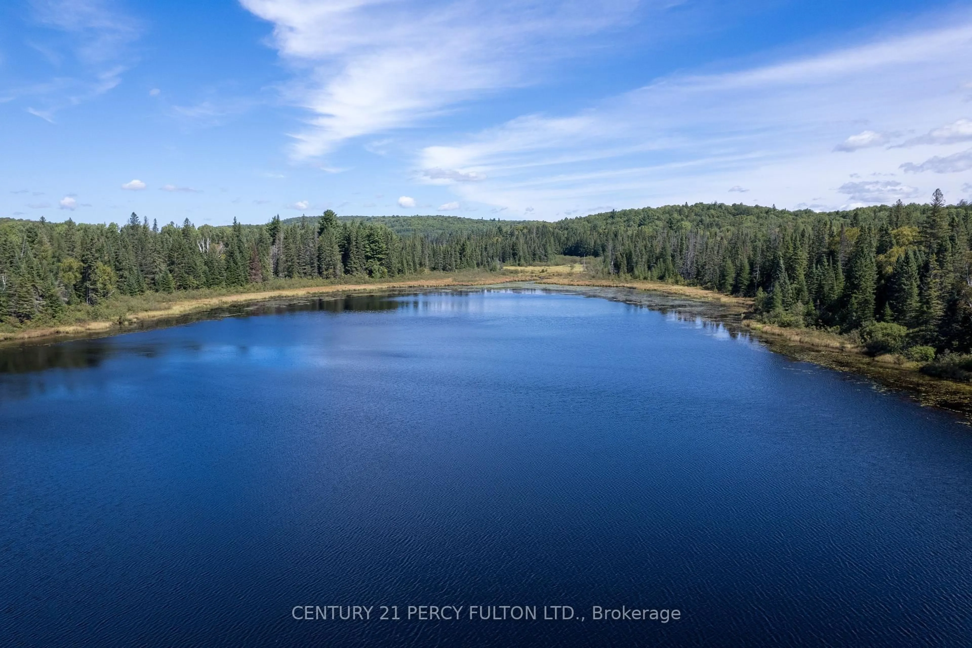 A pic from outside/outdoor area/front of a property/back of a property/a pic from drone, water/lake/river/ocean view for 100 B Baragars Rd, Maynooth Ontario K0L 2K0