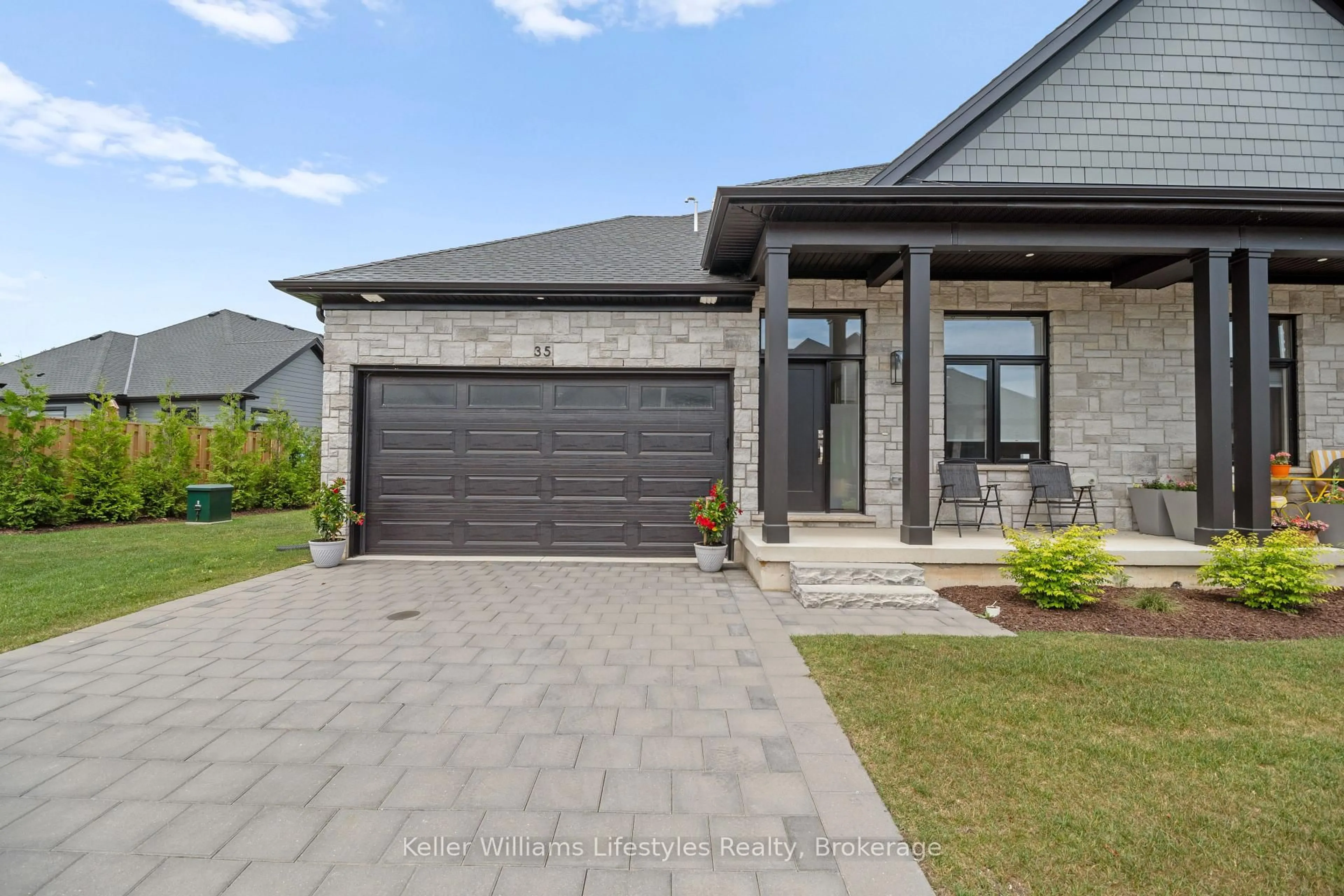 Home with brick exterior material, street for 63 Compass Tr #35, Central Elgin Ontario N5L 0B4