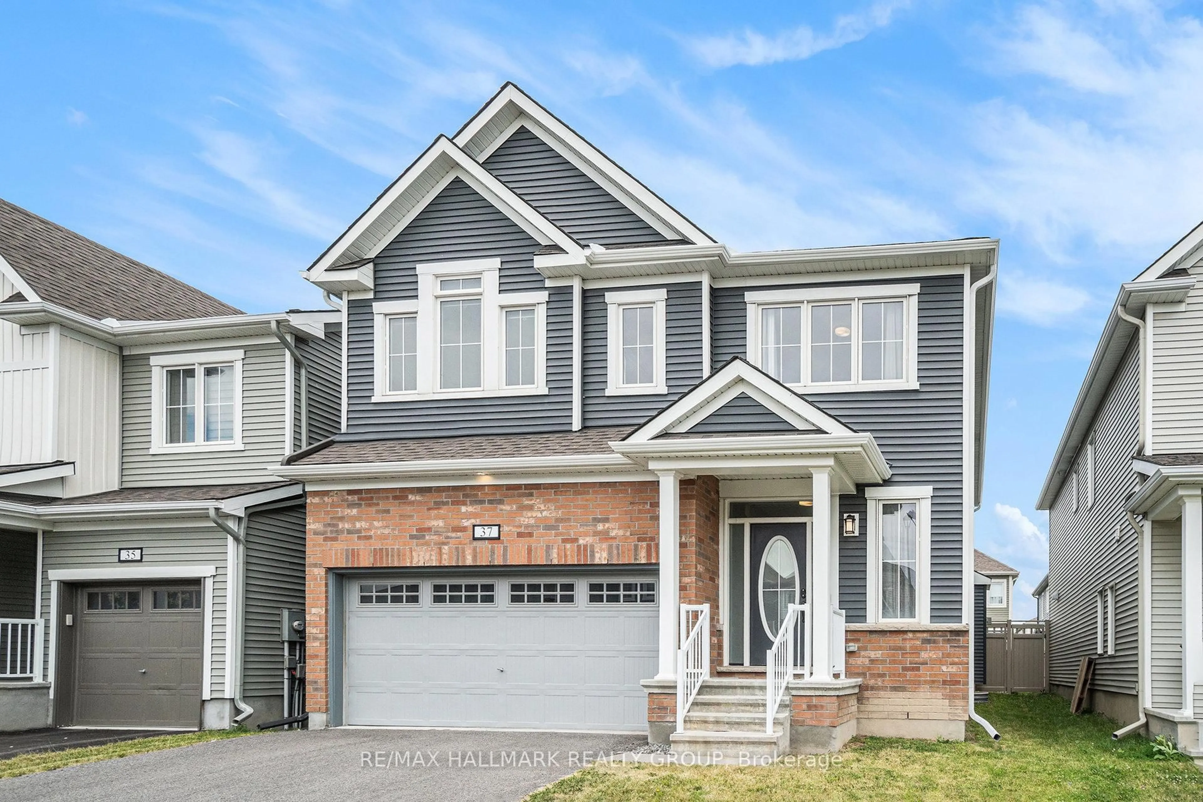 Home with vinyl exterior material, street for 37 Mudminnow Cres, Ottawa Ontario K4A 5H8