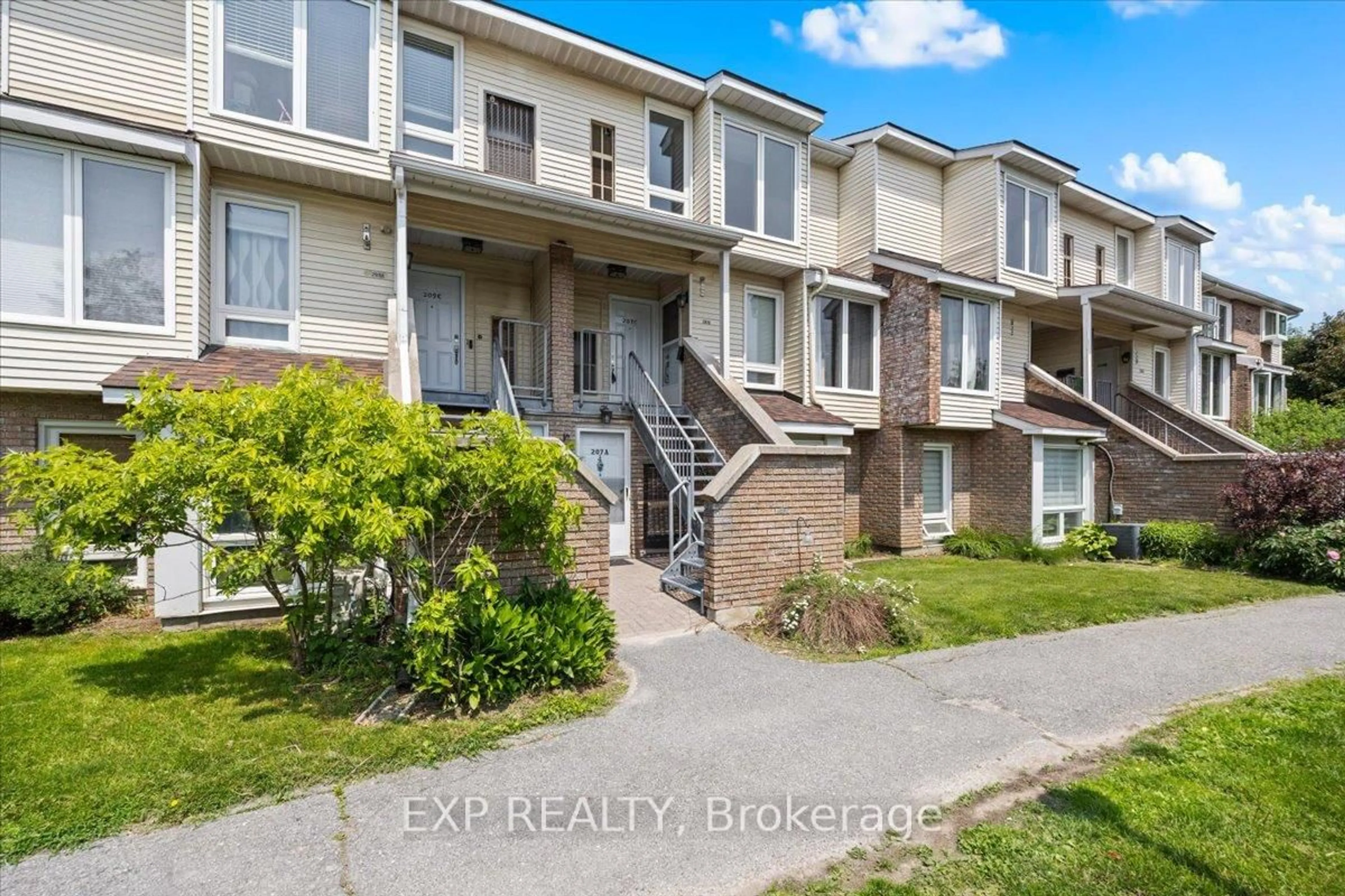 A pic from outside/outdoor area/front of a property/back of a property/a pic from drone, street for 207 Woodfield Dr #B, Ottawa Ontario K2G 4P2
