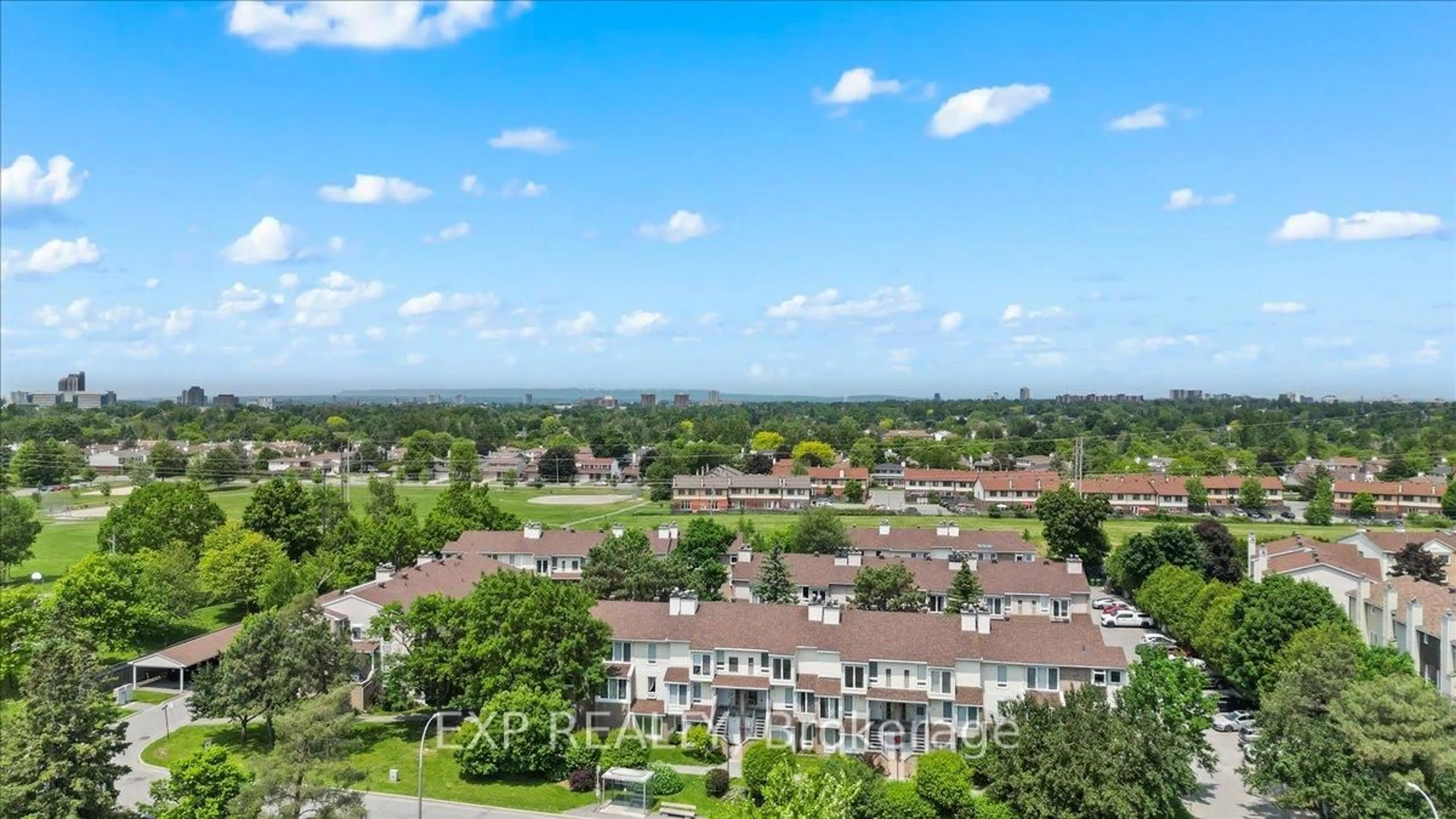 A pic from outside/outdoor area/front of a property/back of a property/a pic from drone, city buildings view from balcony for 207 Woodfield Dr #B, Ottawa Ontario K2G 4P2