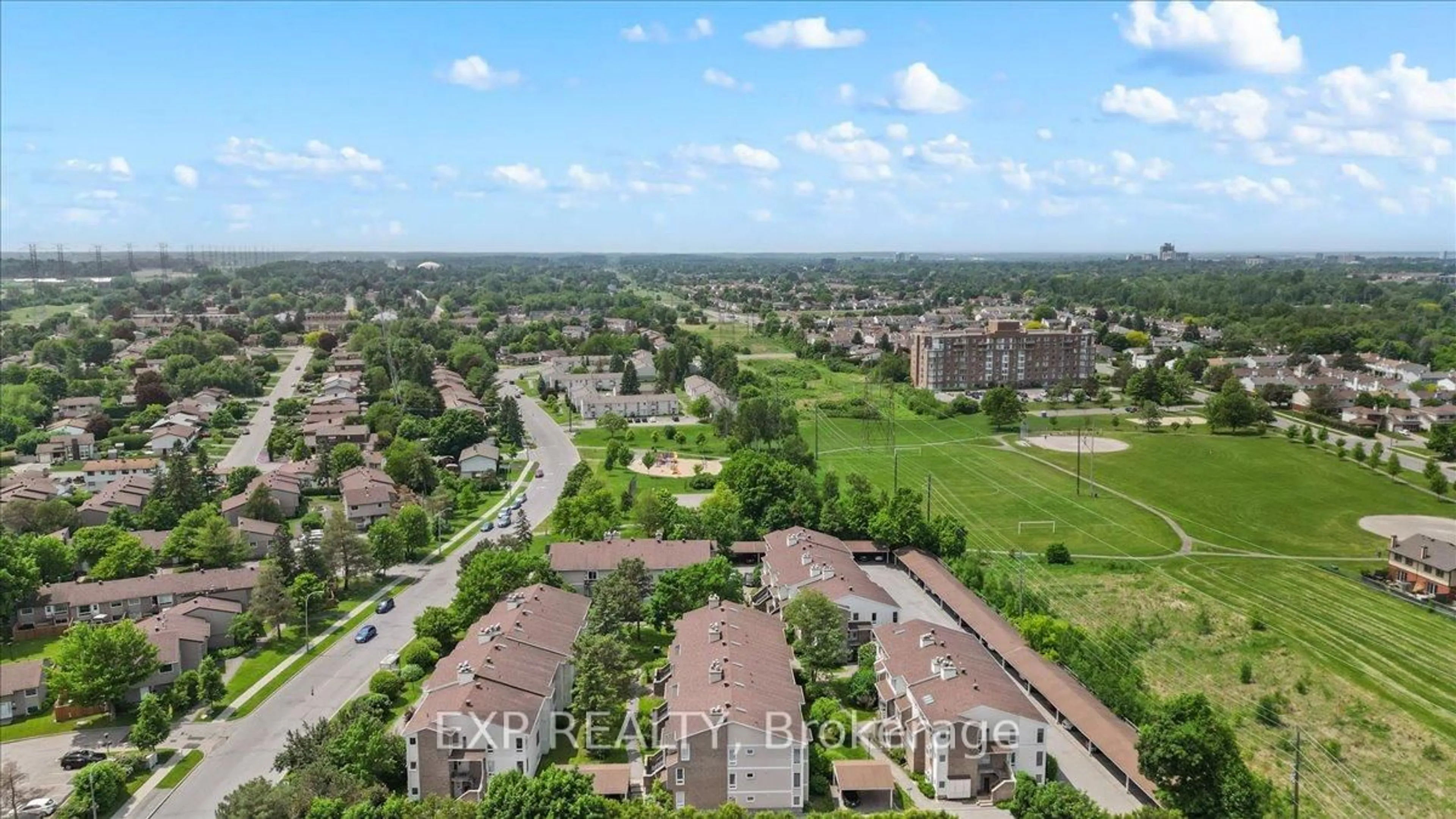 A pic from outside/outdoor area/front of a property/back of a property/a pic from drone, city buildings view from balcony for 207 Woodfield Dr #B, Ottawa Ontario K2G 4P2