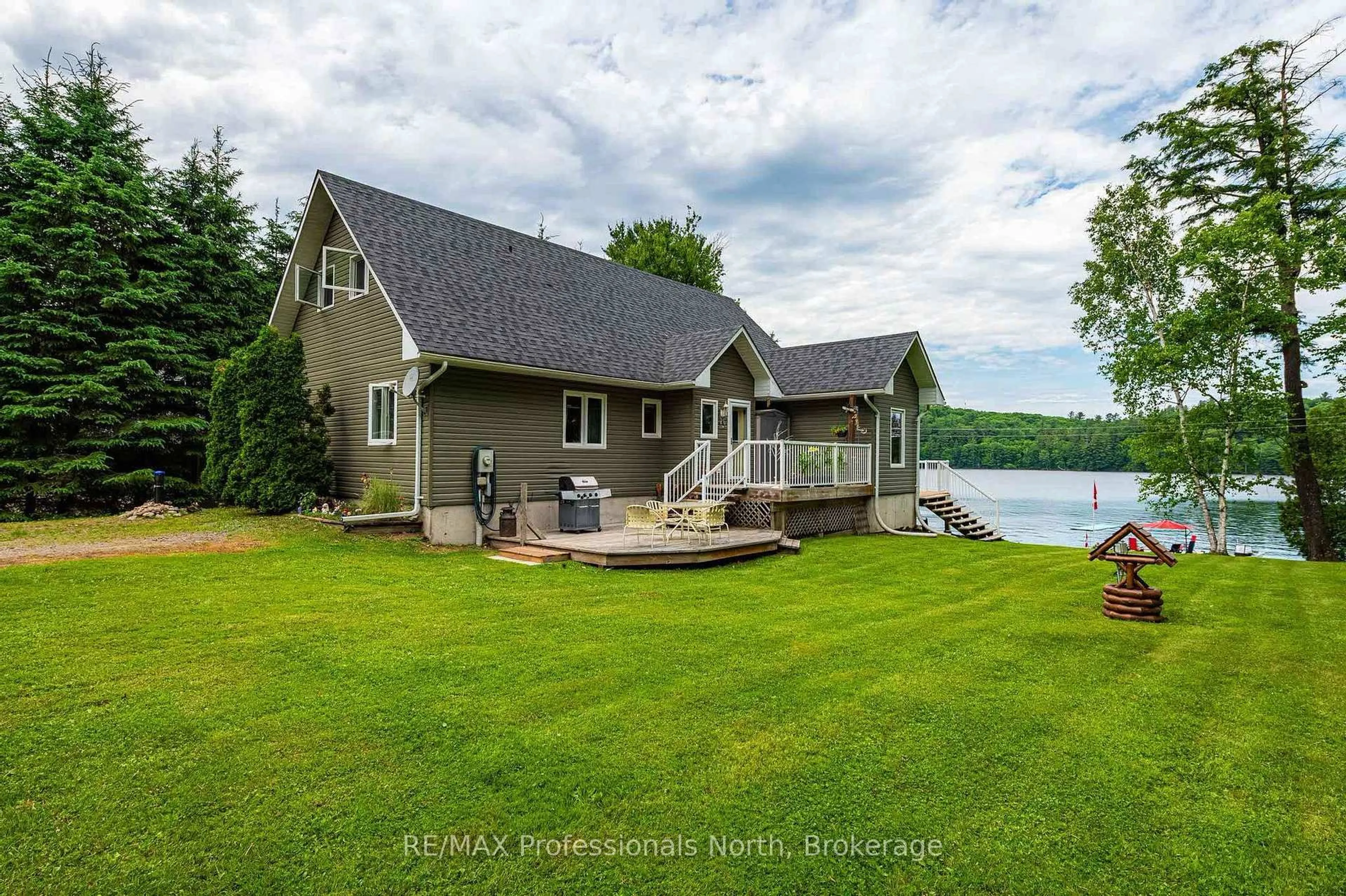 A pic from outside/outdoor area/front of a property/back of a property/a pic from drone, water/lake/river/ocean view for 1075 Comak Cres, Algonquin Highlands Ontario K0M 1S0