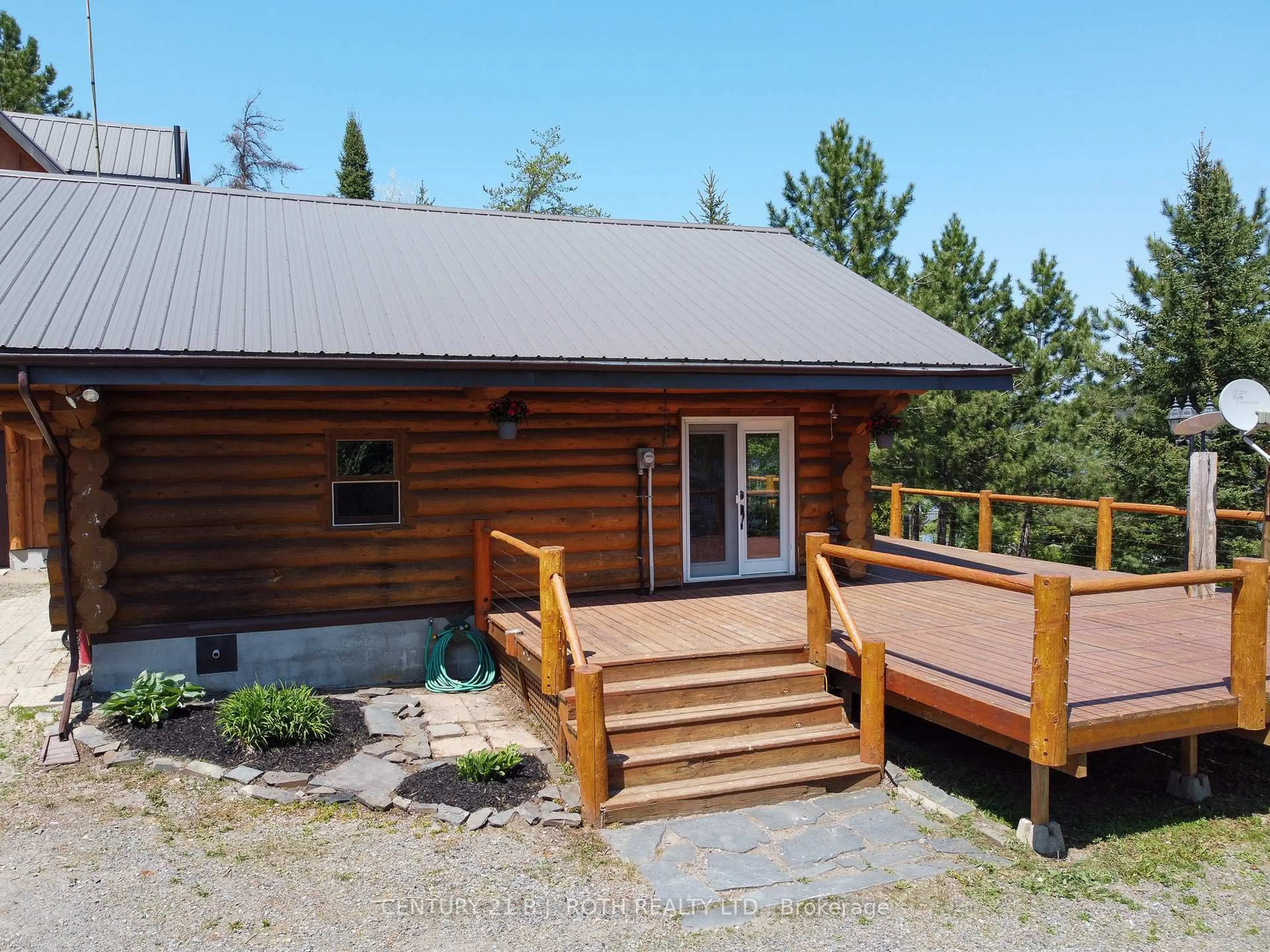 A pic from outside/outdoor area/front of a property/back of a property/a pic from drone, unknown for 59 White Bear Crt, Temagami Ontario P0H 2H0